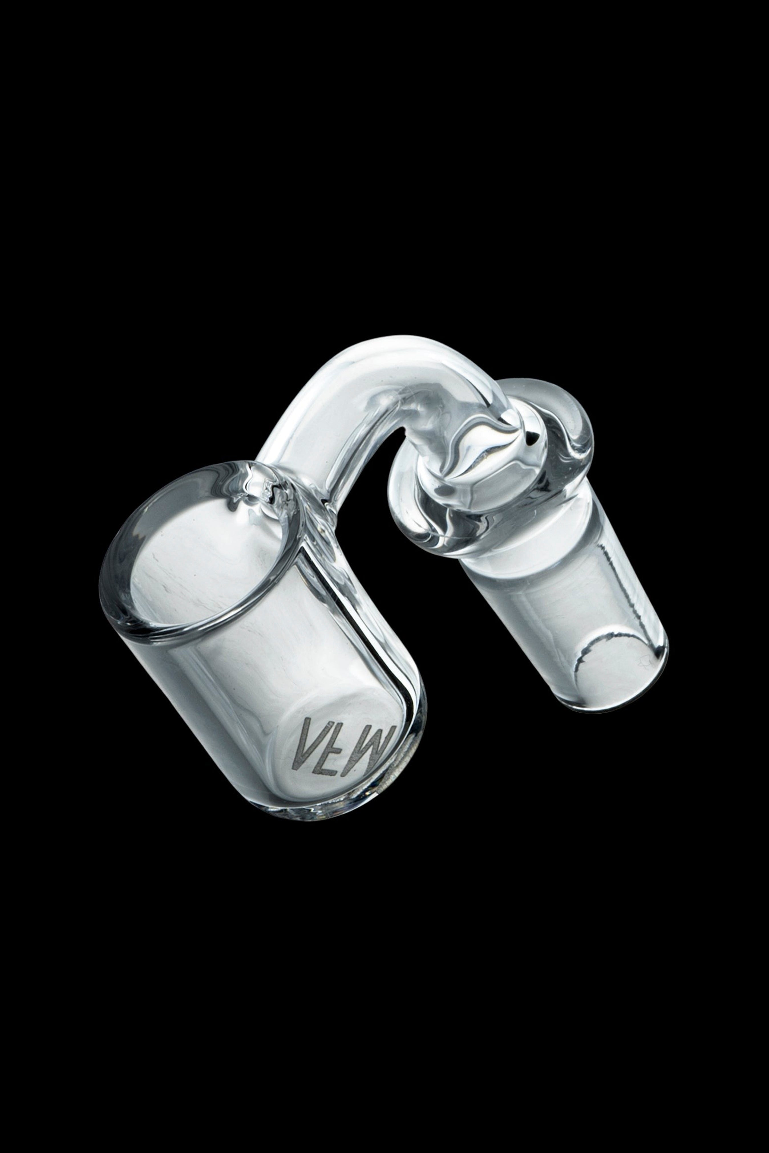 Clear glass dab rig nail with carb cap, isolated on black.