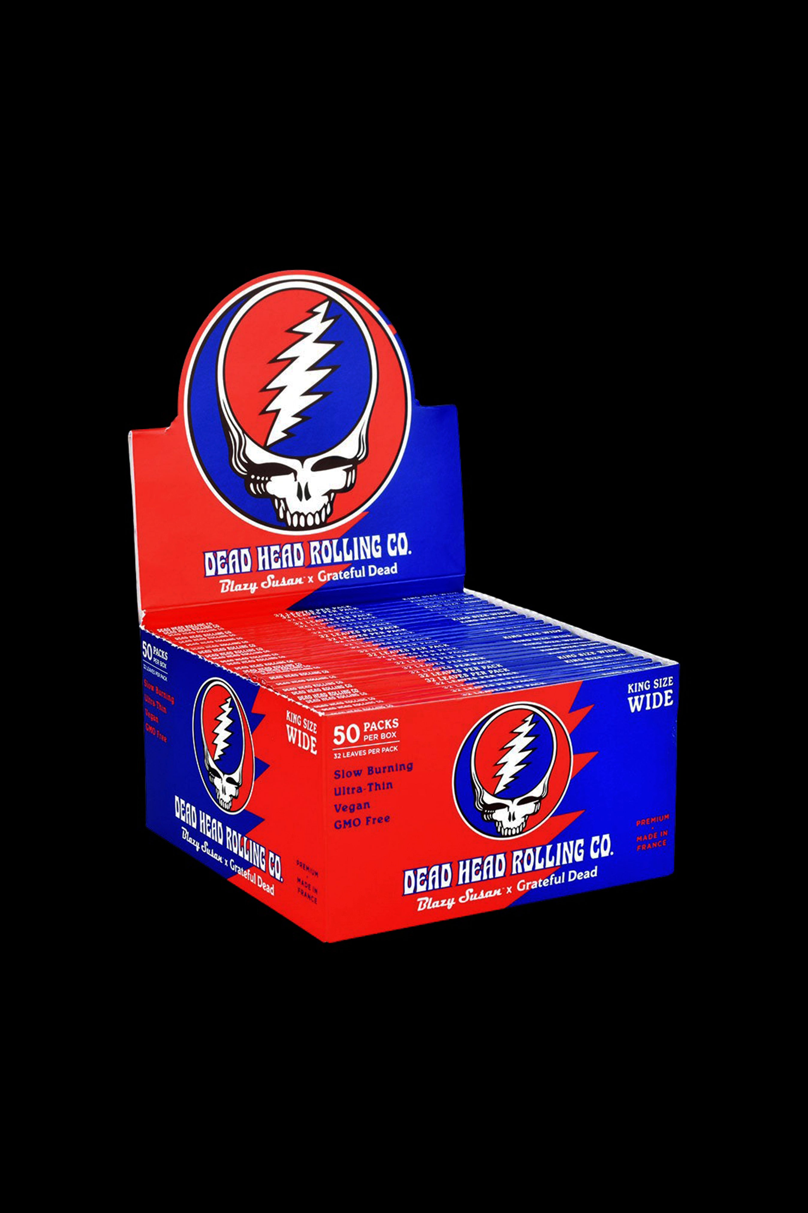 A display box of “Dead Head Rolling Co.” rolling papers featuring the iconic Grateful Dead “Steal Your Face” skull logo.