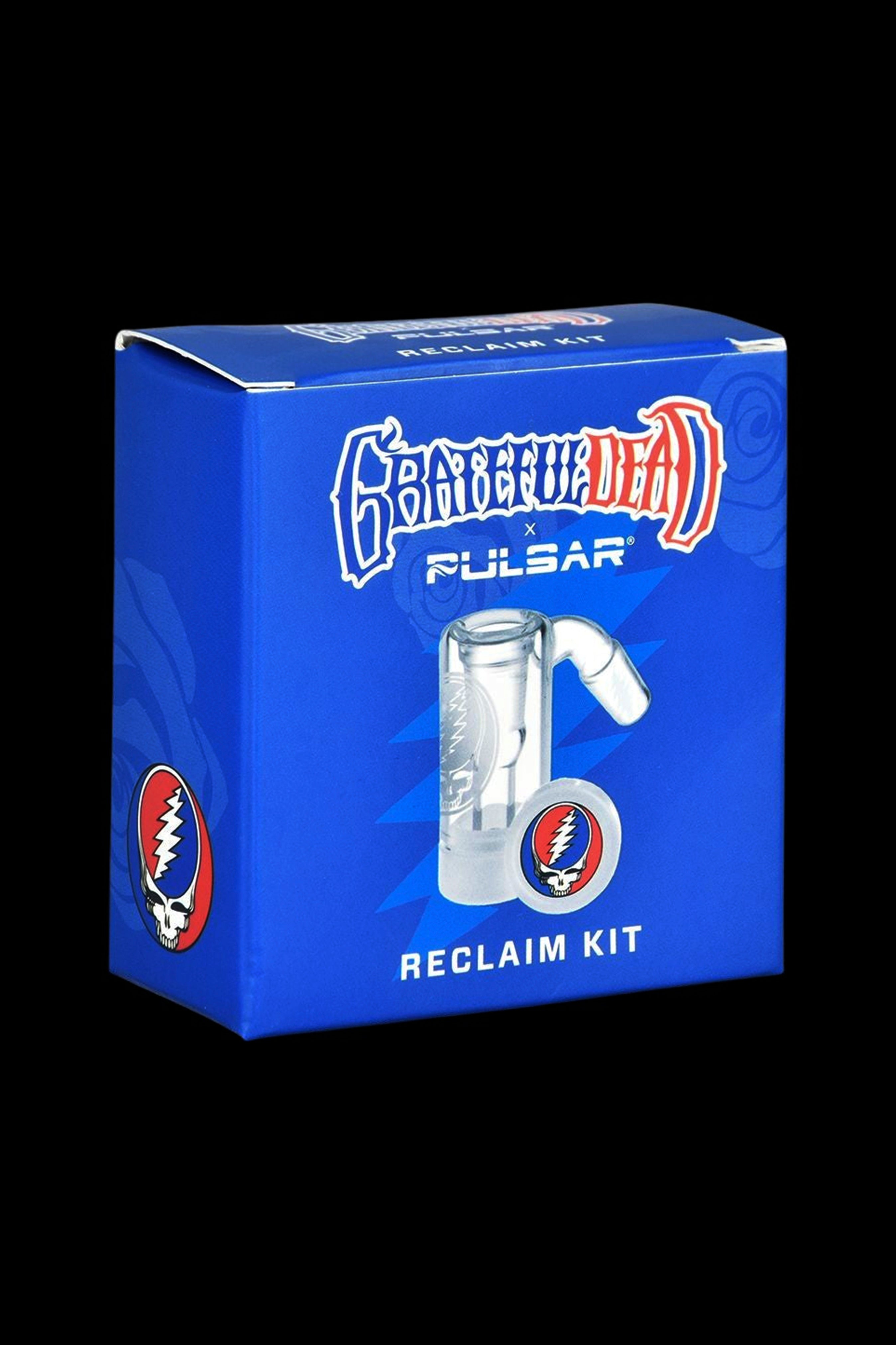 Blue box for a "Reclaim Kit" featuring Grateful Dead-inspired branding and a glass dab tool inside.