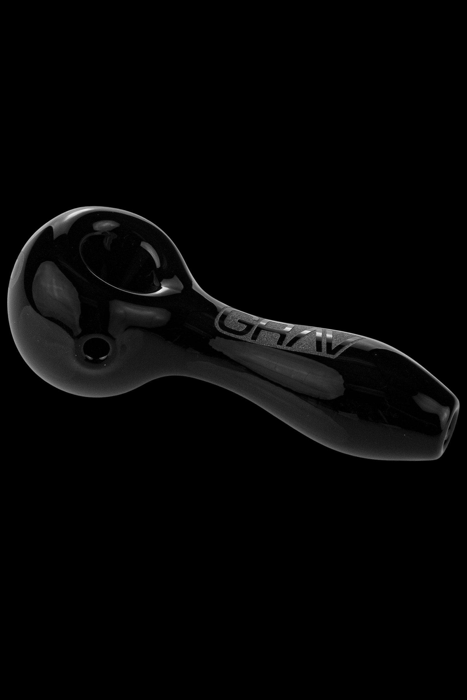 Black glass smoking pipe with "GRAV" etched along the side.