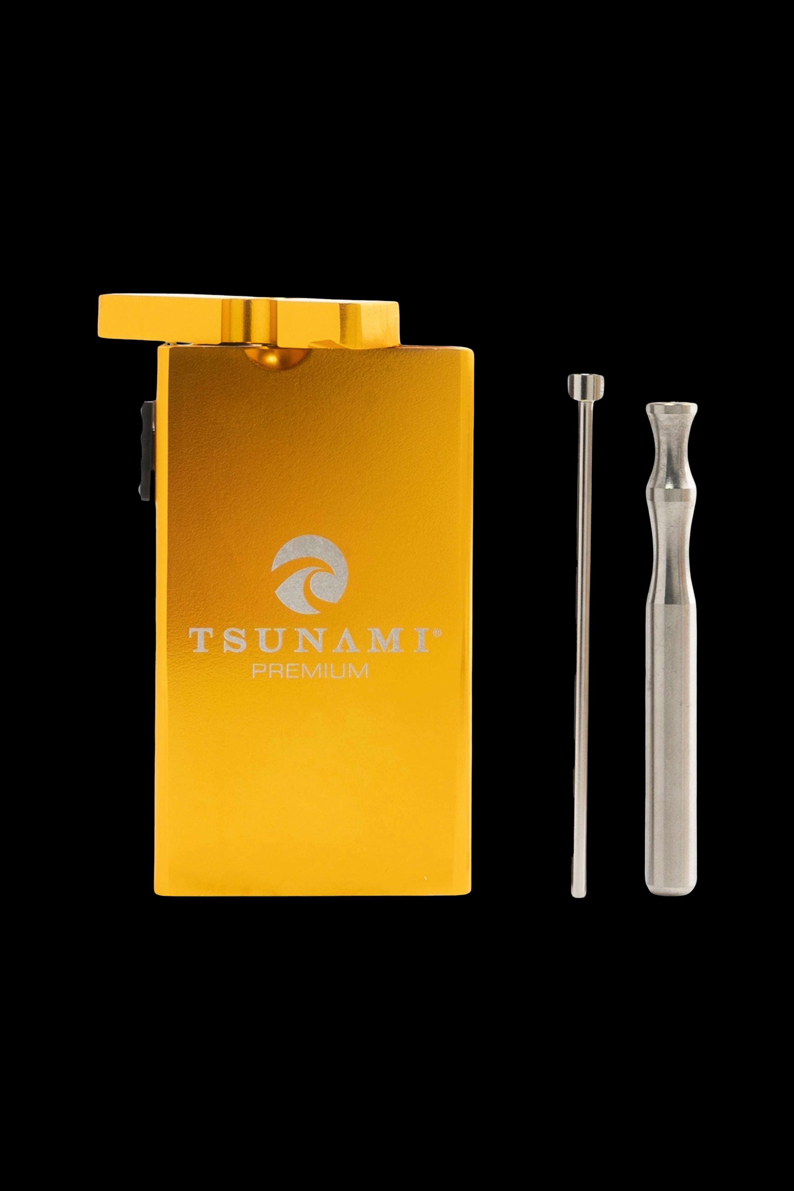 Gold cannabis concentrate vaporizer pen with accompanying dab tool.