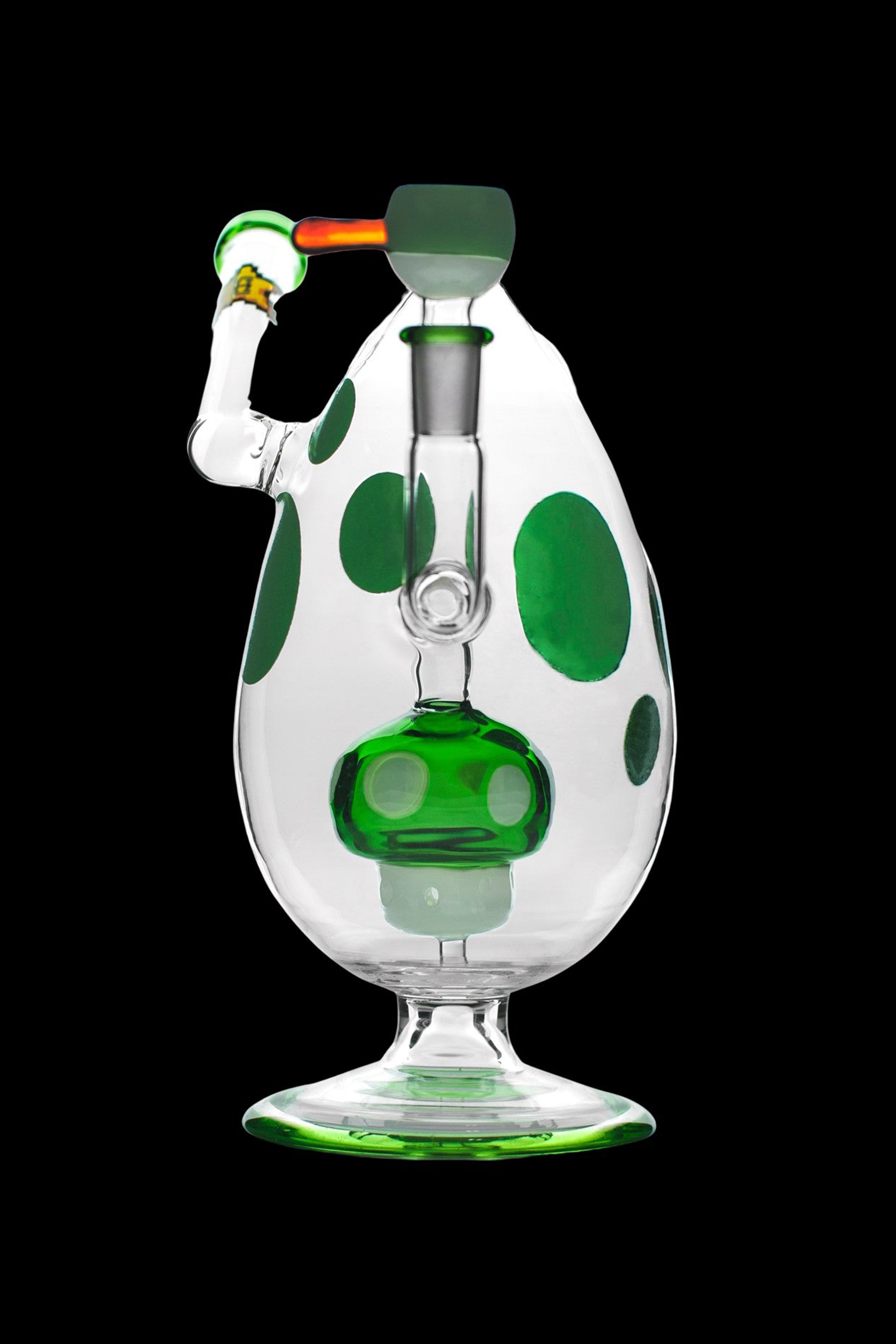 Green and white patterned glass water pipe (bong) with unique sculptural design.