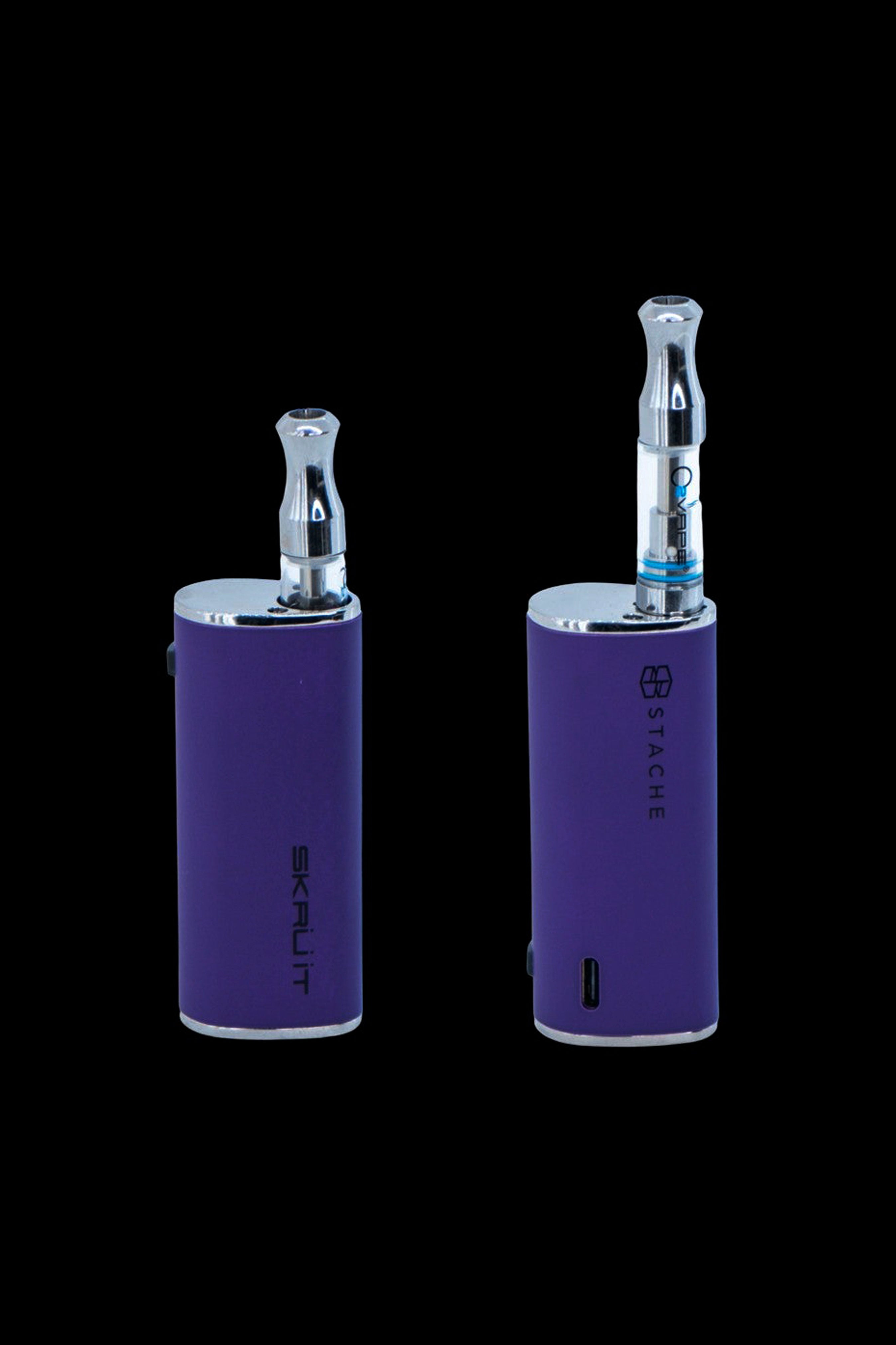 Two purple cannabis vape pens with visible oil cartridges, branded "Skruit" and "Stache."