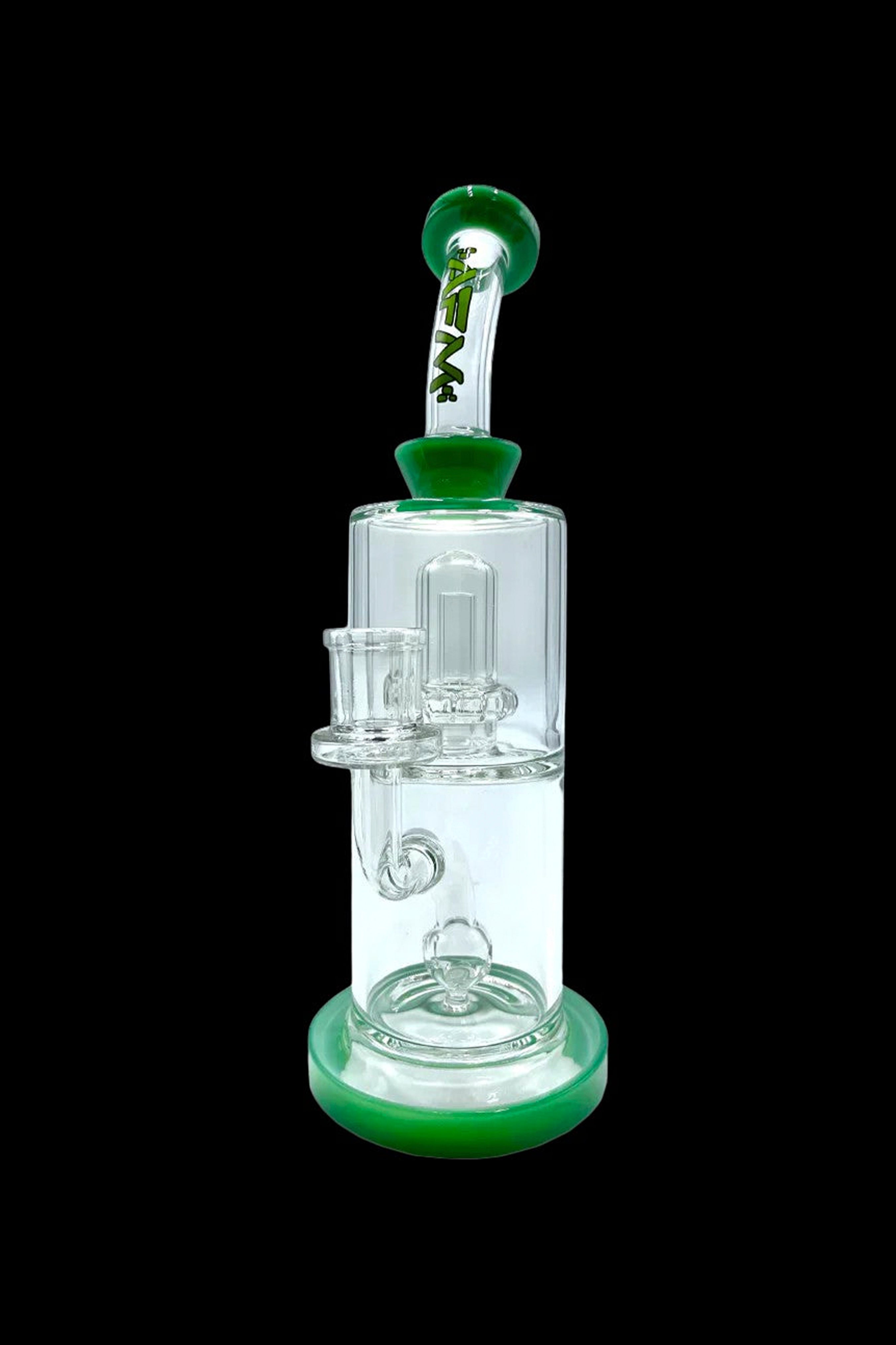 Green and clear glass water pipe (bong) with intricate bubbler design.