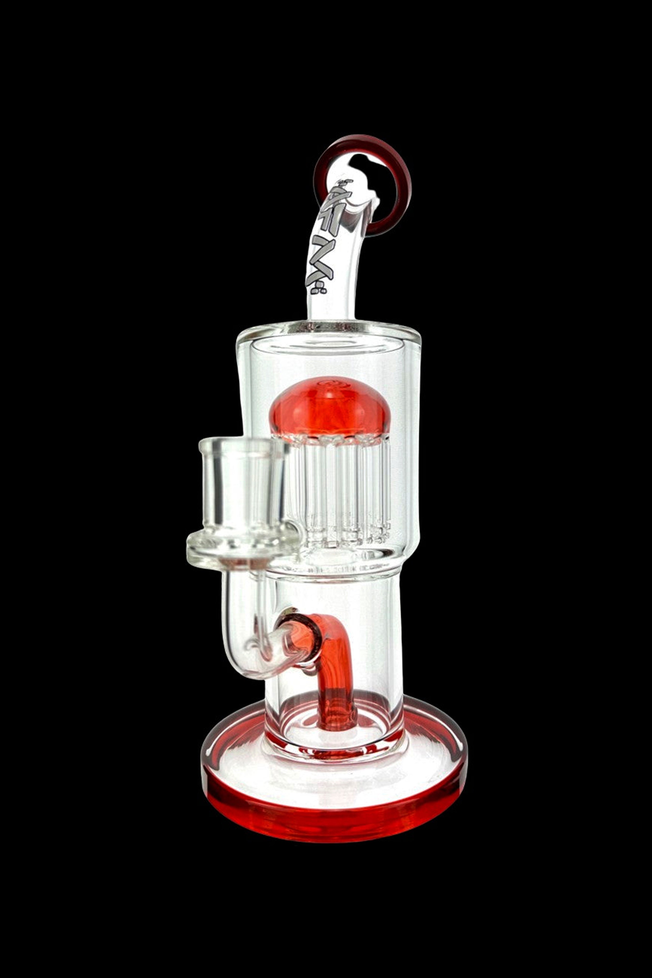 Red and clear glass water pipe (rig) with multiple diffusion percolators, isolated on a black background.