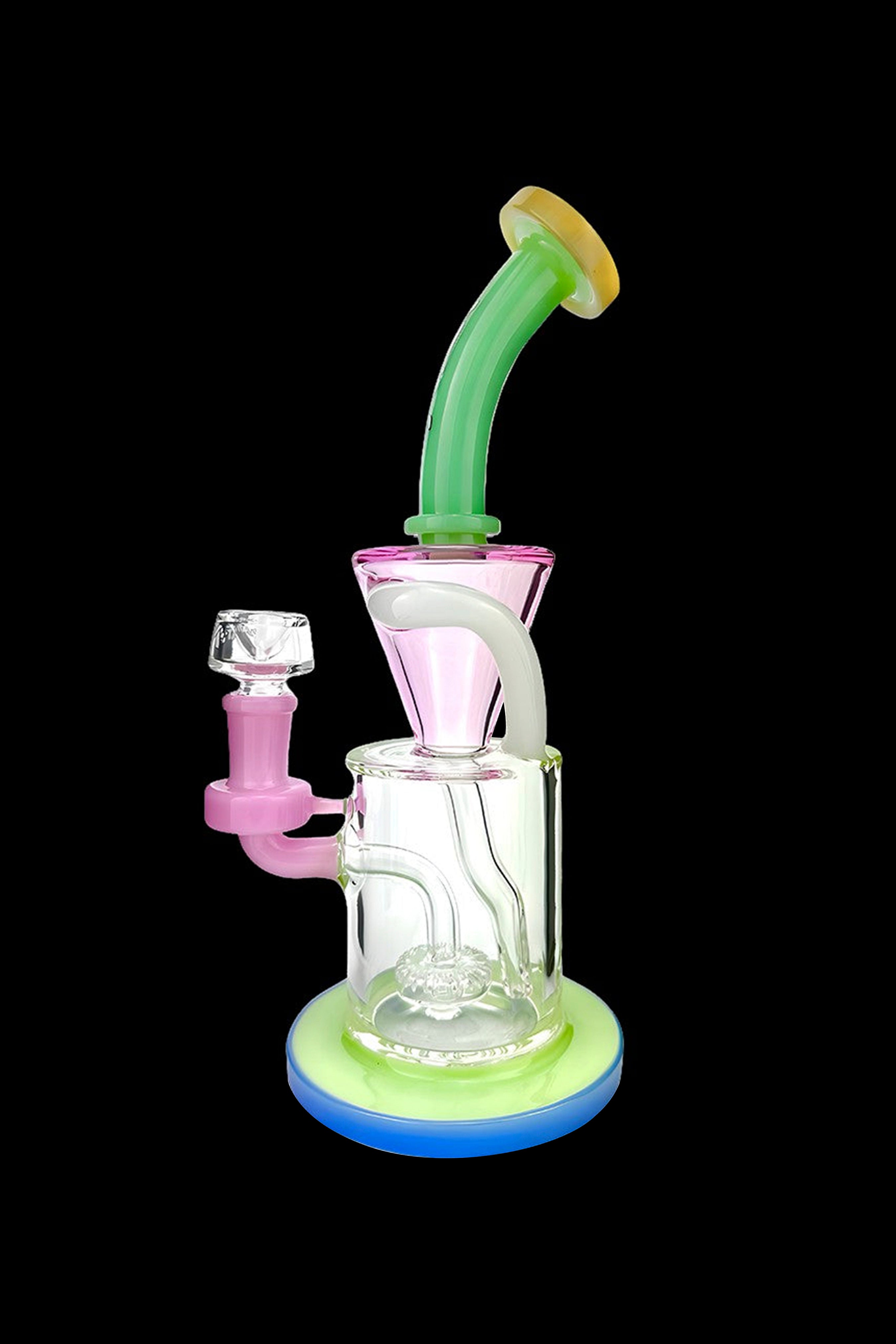 Colorful glass water pipe (bong) with a clear chamber and pink and green accents.