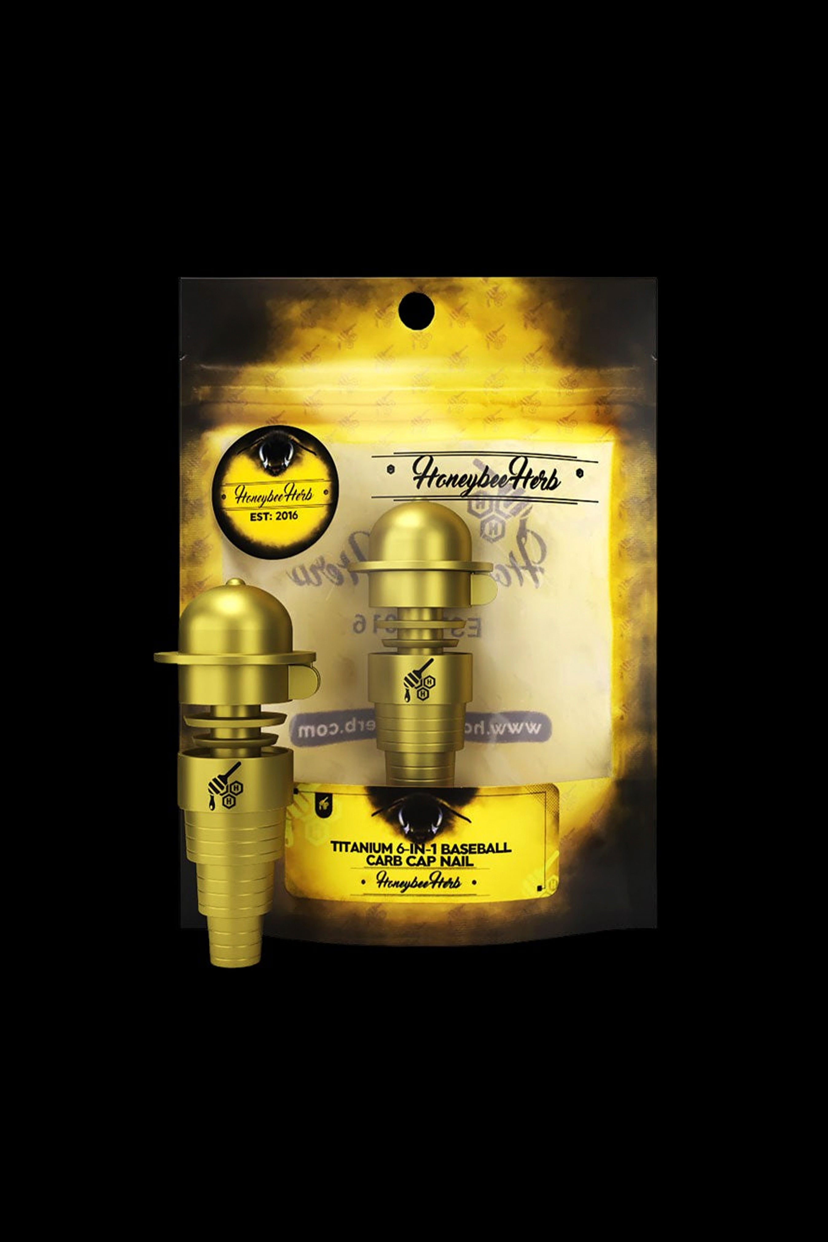 Gold titanium dabbing nail and carb cap set packaged on a black card with “Honeybee Herbs” branding.