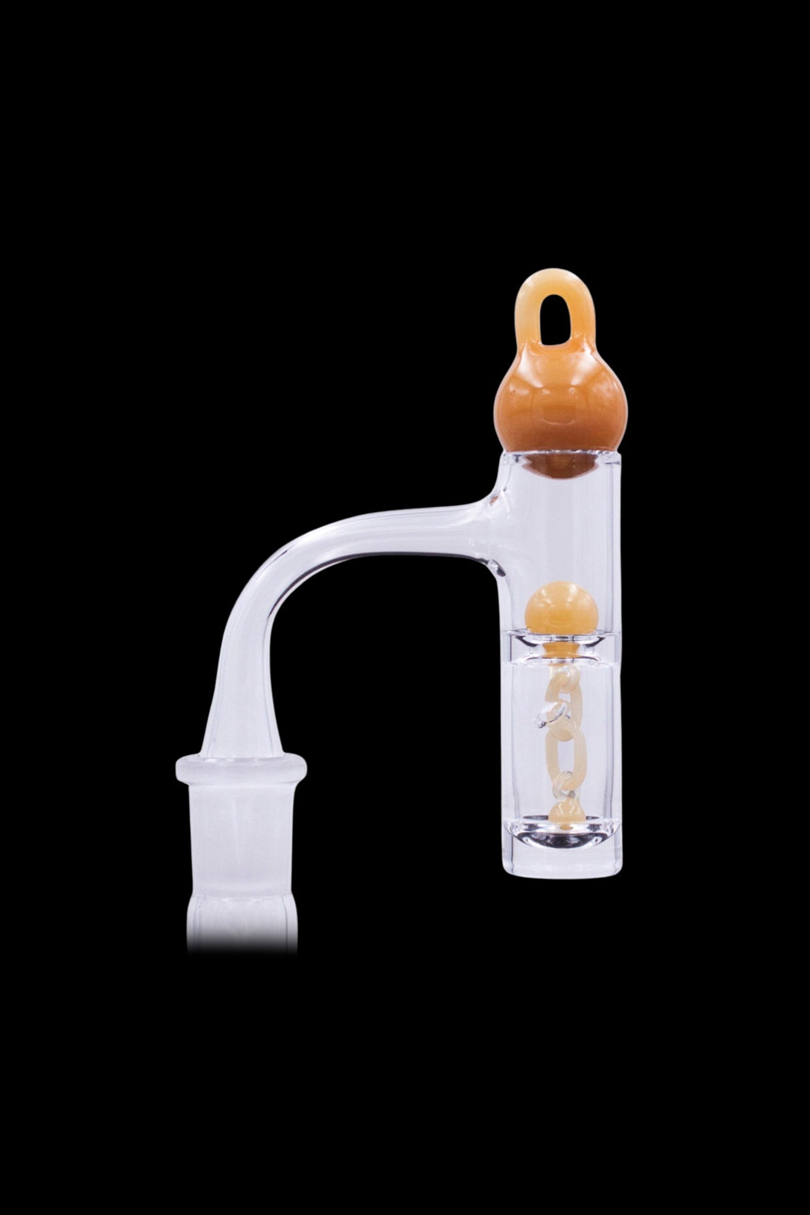 Clear glass oil rig with amber accents.