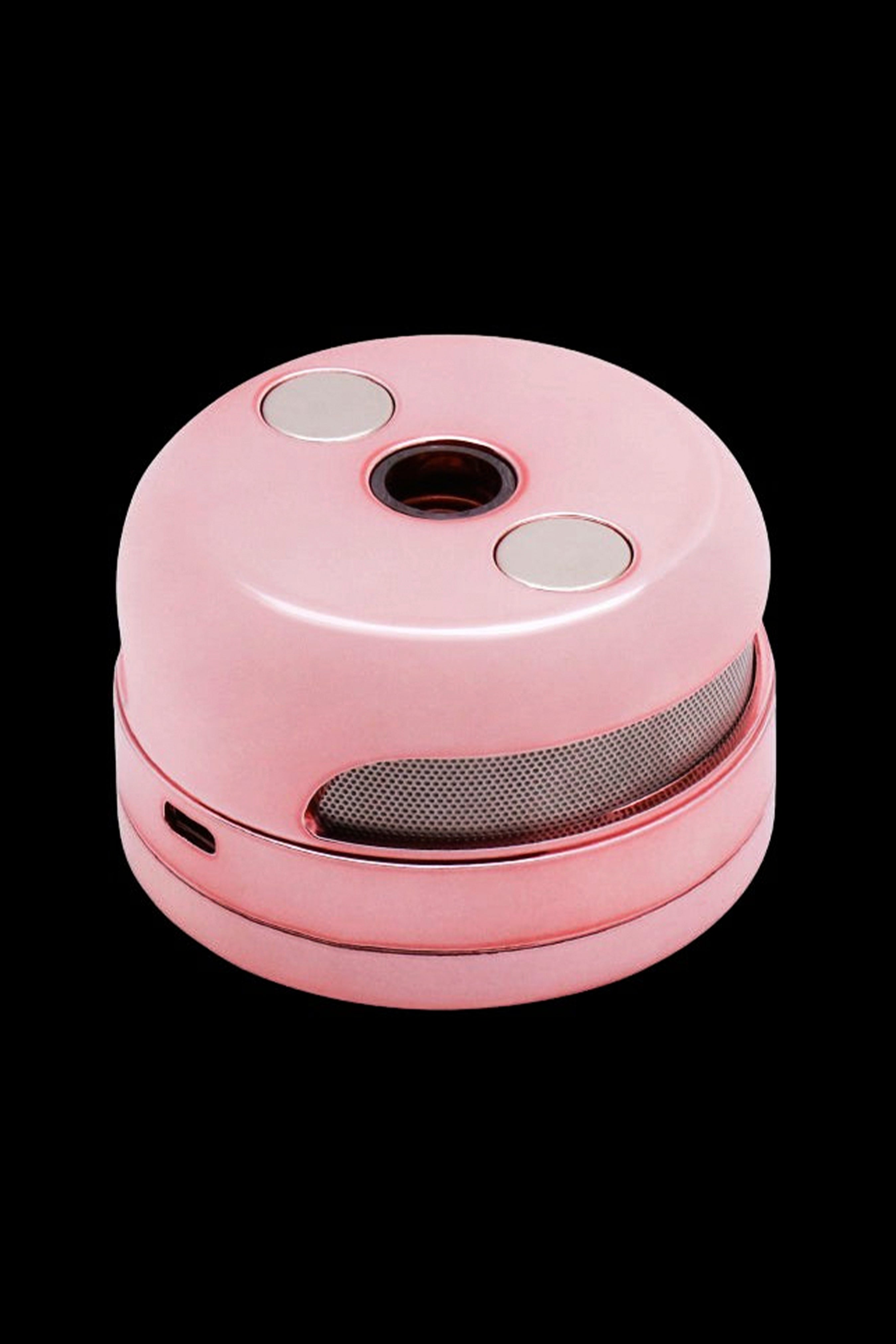 Dusty rose portable dry herb vaporizer with button controls and charging port.