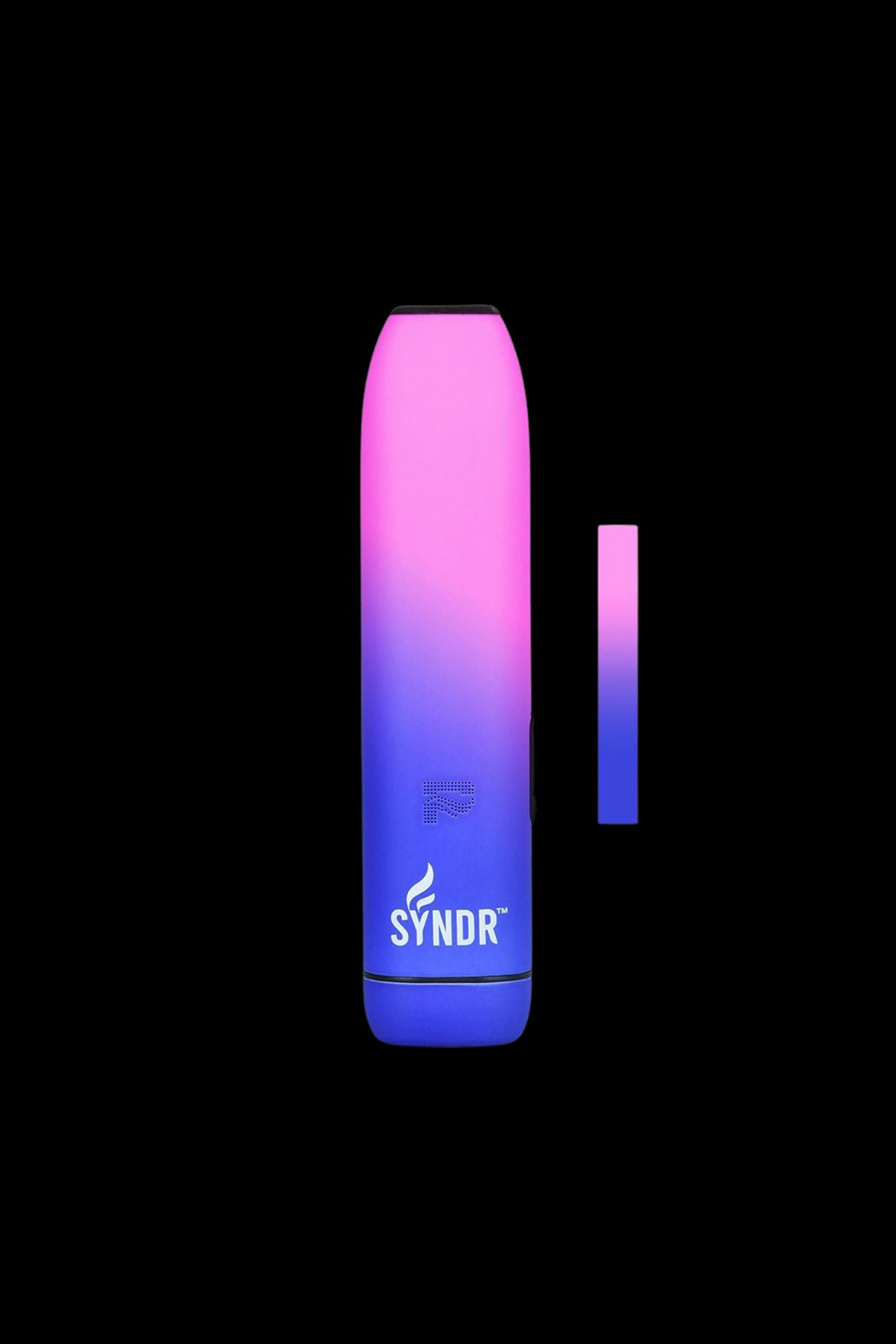Syndr cannabis vape pen with gradient purple and pink finish, displayed with its cartridge.