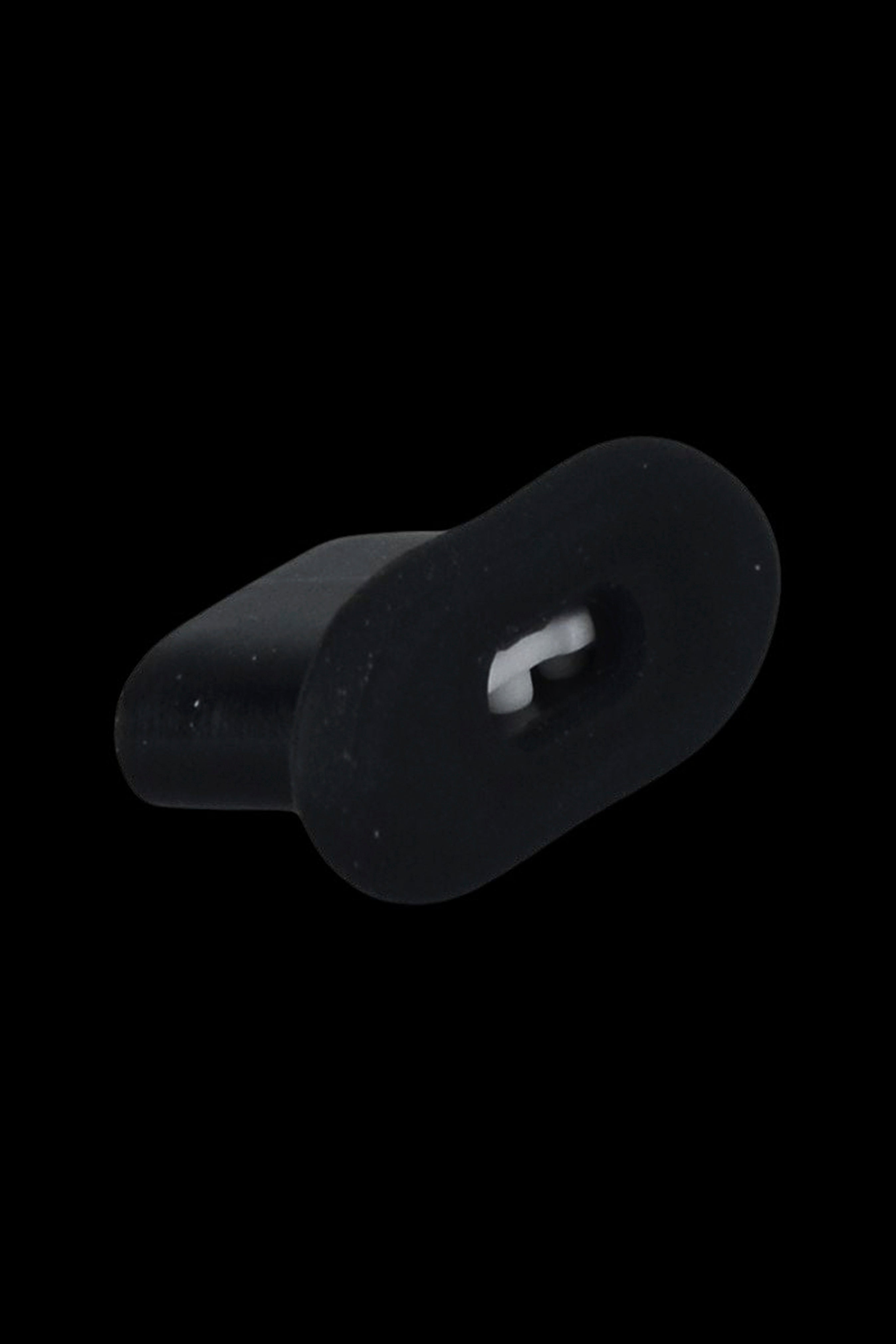 Black silicone cannabis carb cap with a directional airflow insert.