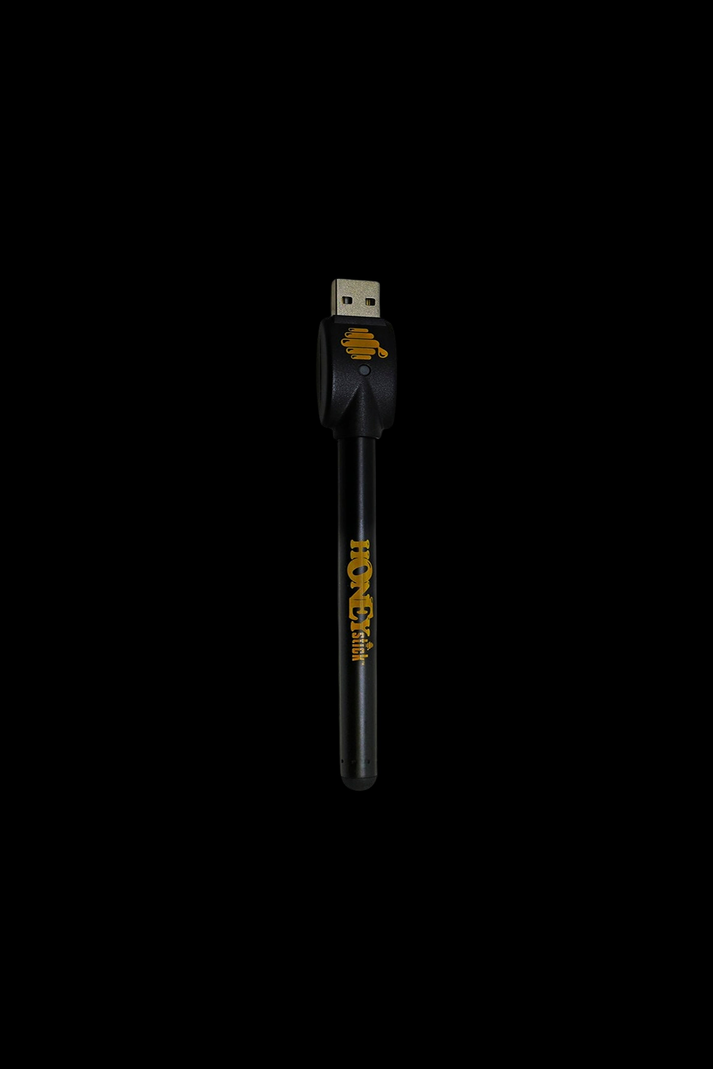 Black USB-powered dab pen with gold branding.