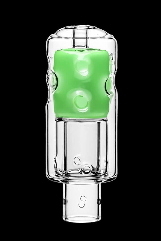 Green glass cannabis oil rig bubbler with intricate glasswork.