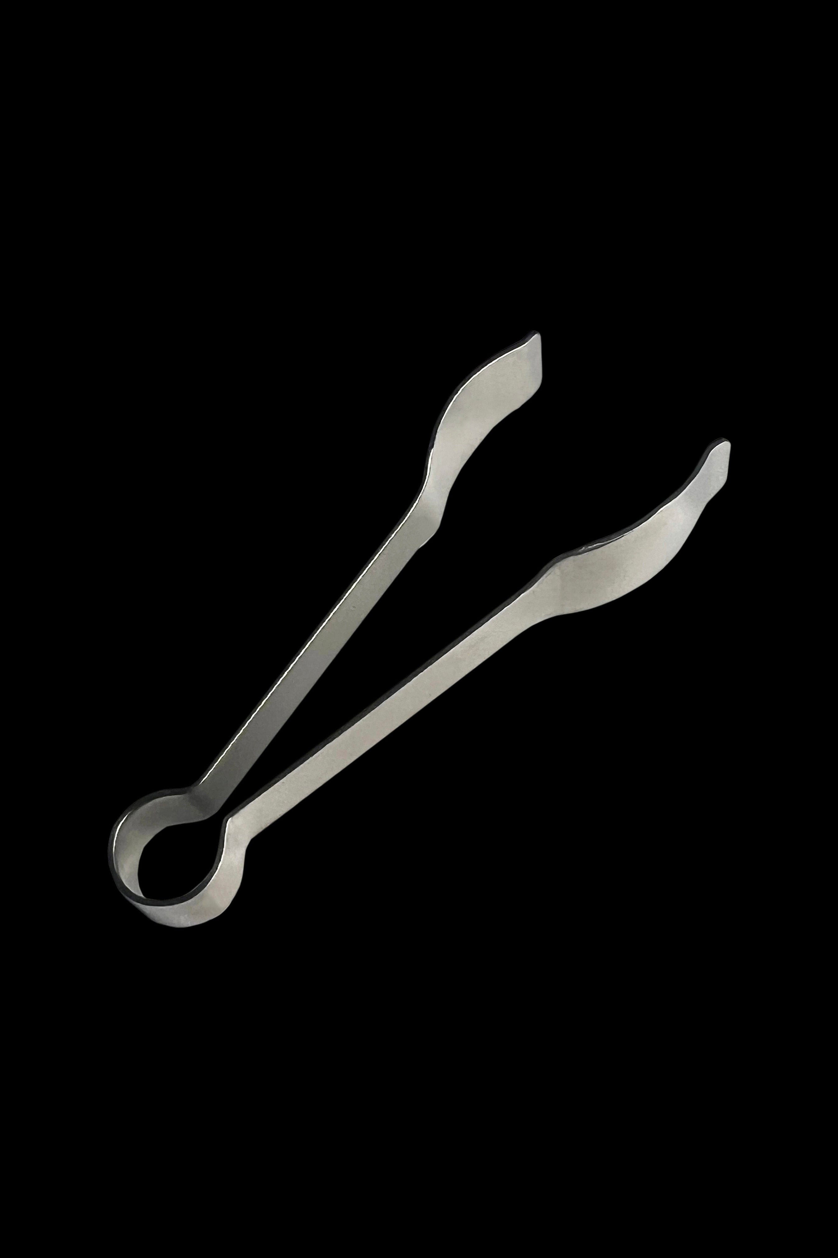 Silver cannabis tweezers on a black background.