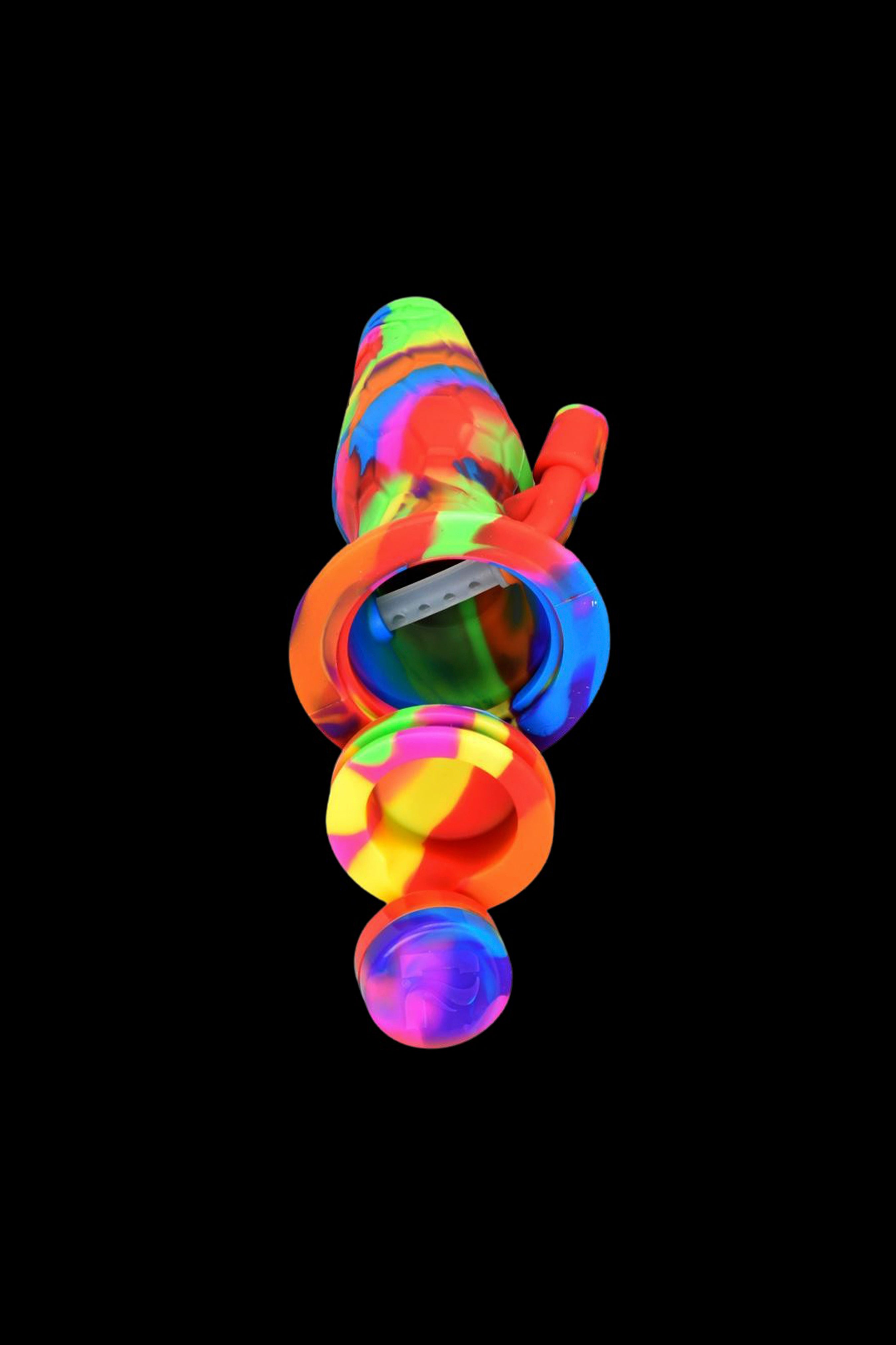 Colorful silicone bubbler with glass bowl, isolated on black.