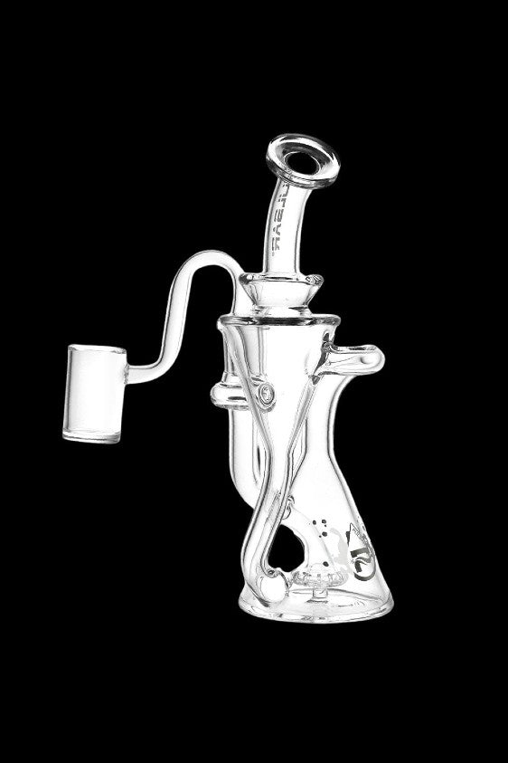 Clear glass water pipe (rig) with intricate design and mouthpiece, isolated on black.