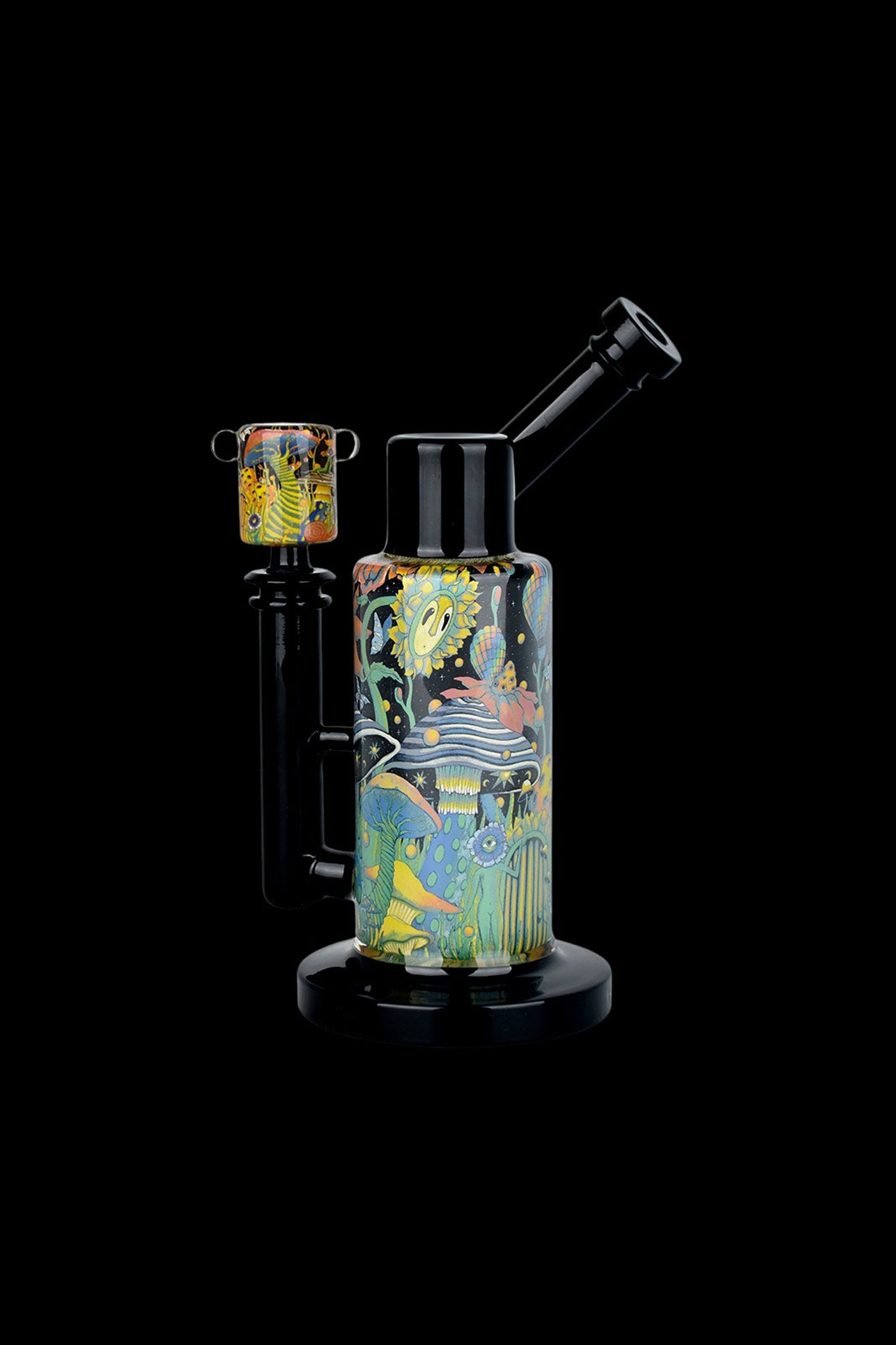 Colorful glass water pipe (bong) with psychedelic botanical artwork, displayed against a black background.