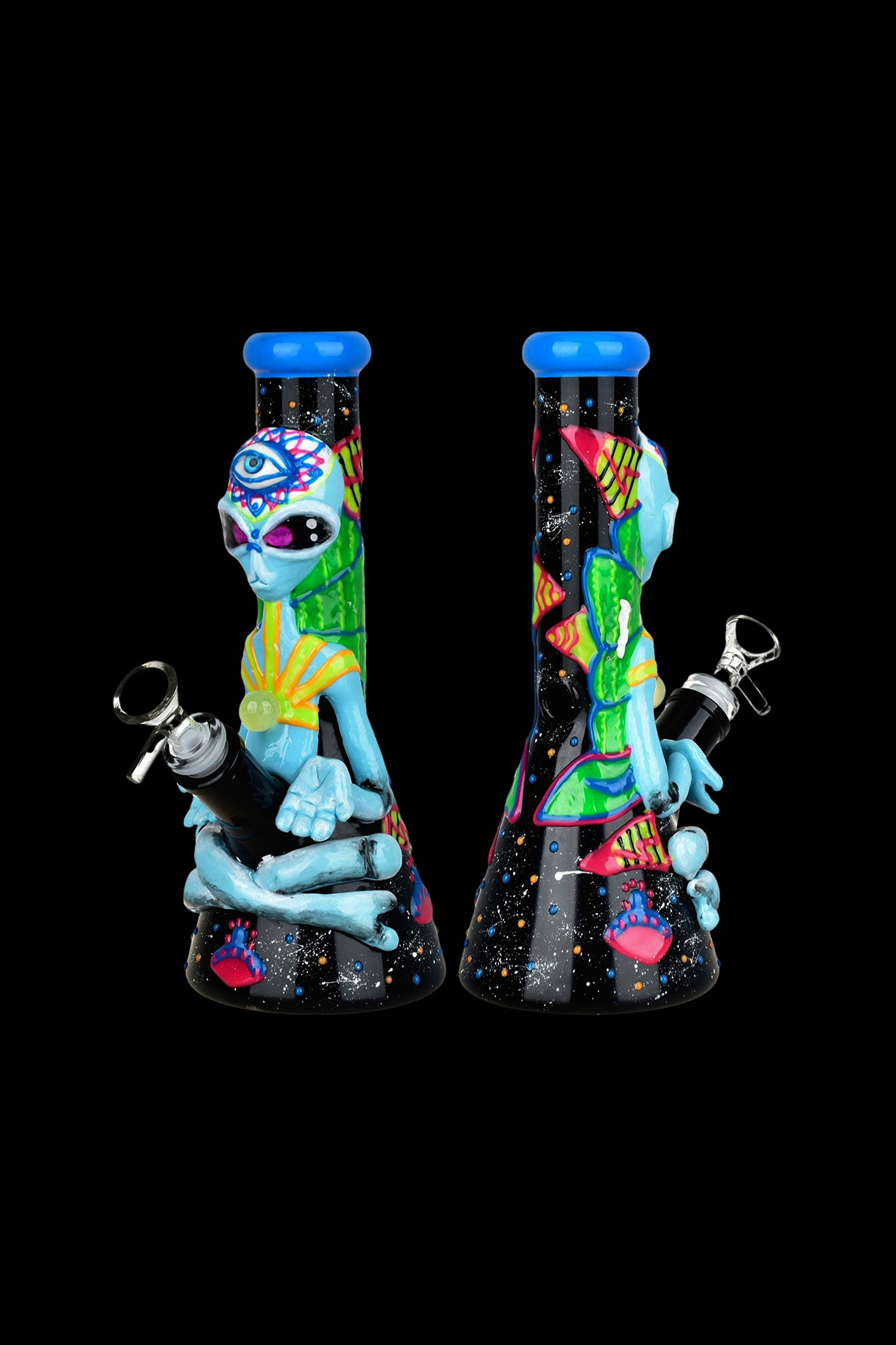Colorful glass water pipe featuring an alien design, displayed against a black background.