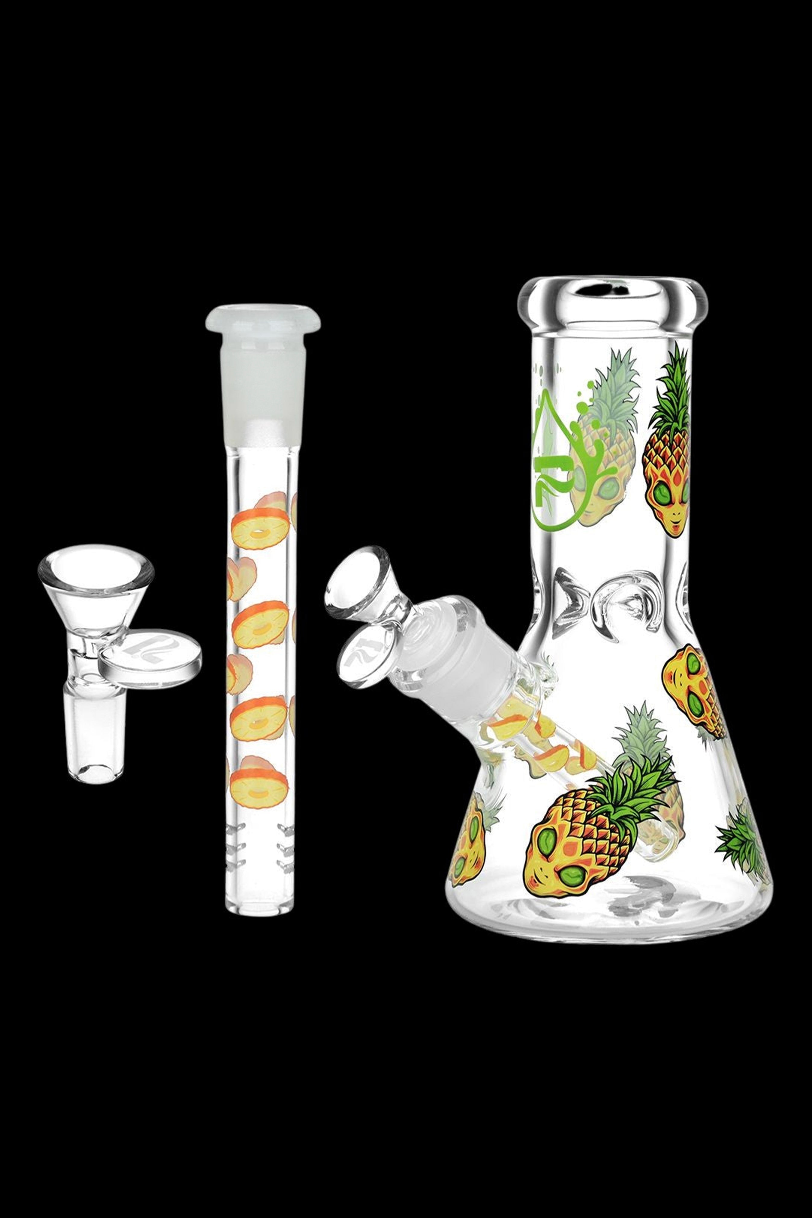 Glass bong and downstem decorated with pineapple designs, isolated on a white background.