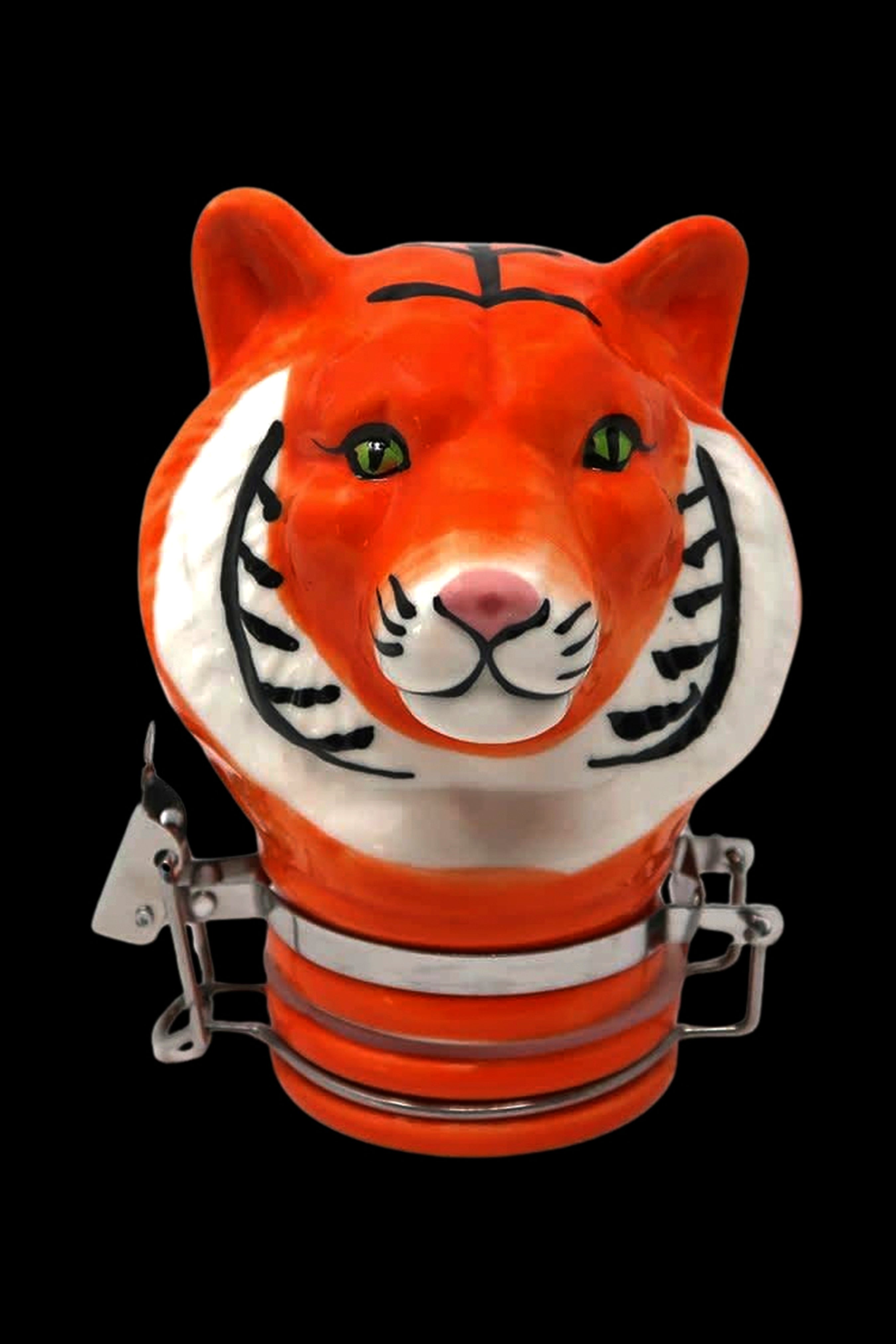 Ceramic tiger-shaped container with metal clamps, likely for cannabis storage.