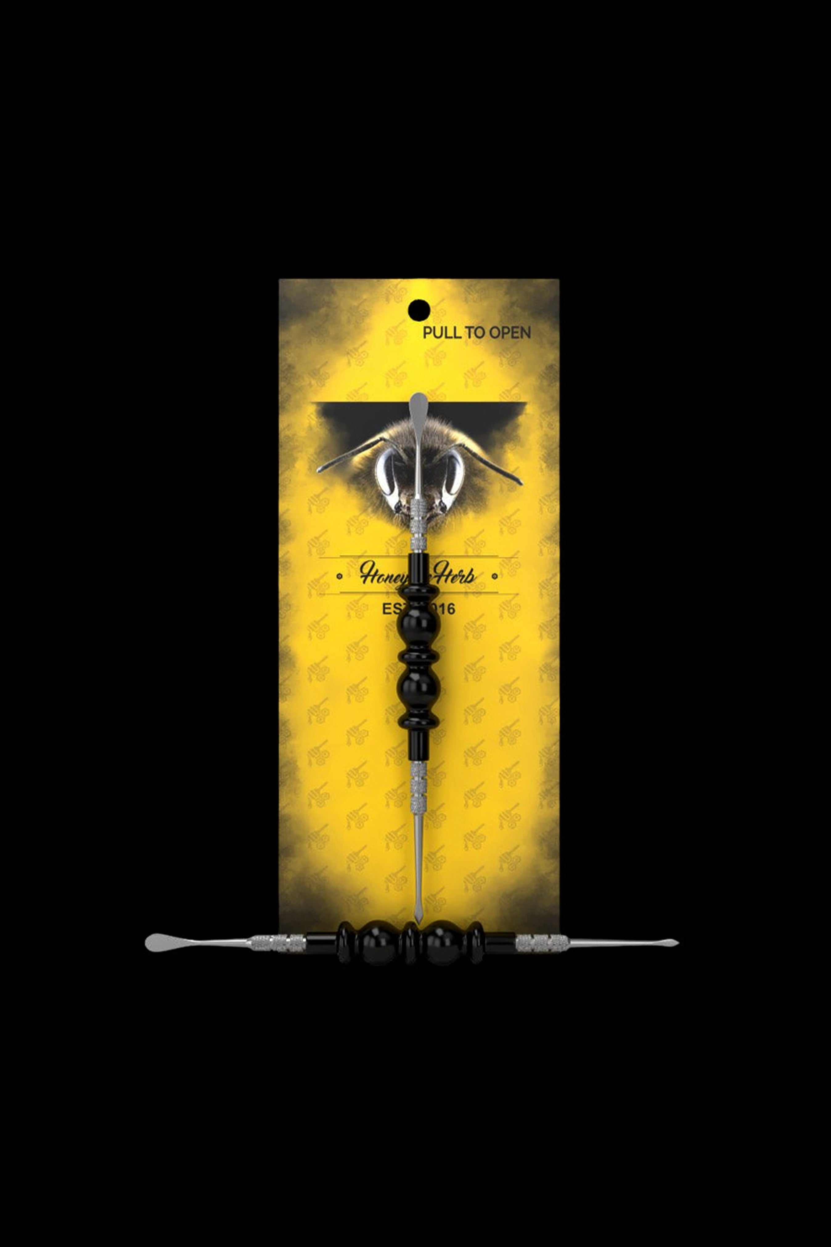 A packaged cannabis dab tool with a bee-themed design and branding ("Honey Herb").