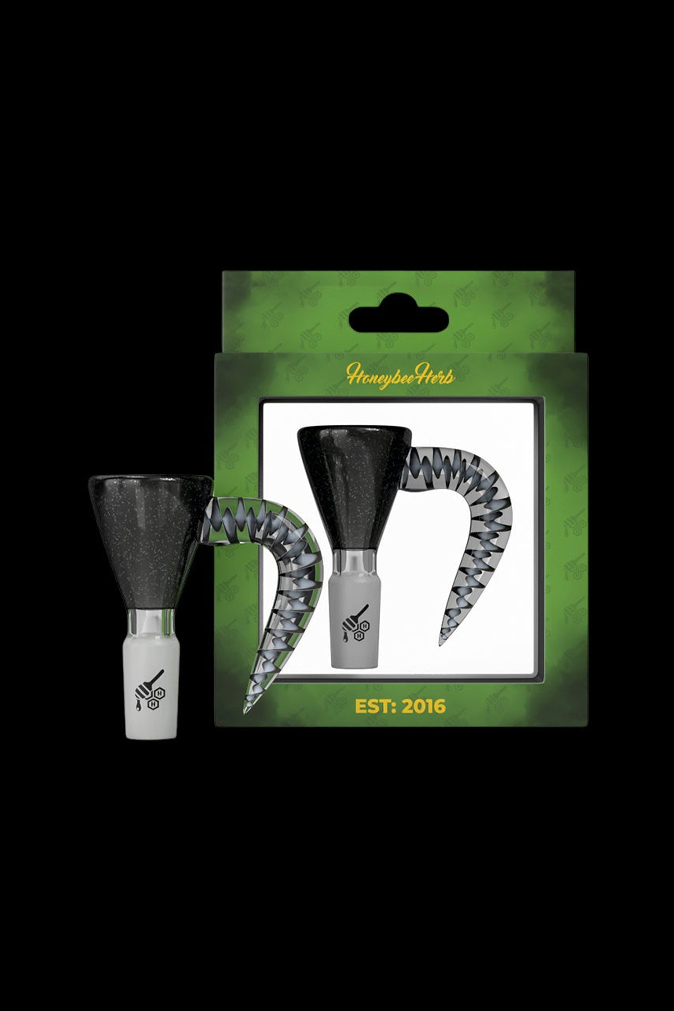 Packaged cannabis pollen presser with a black textured grip and silver tip, displayed on a green card with “Honeybee Herbs” branding and “EST. 2016” text.