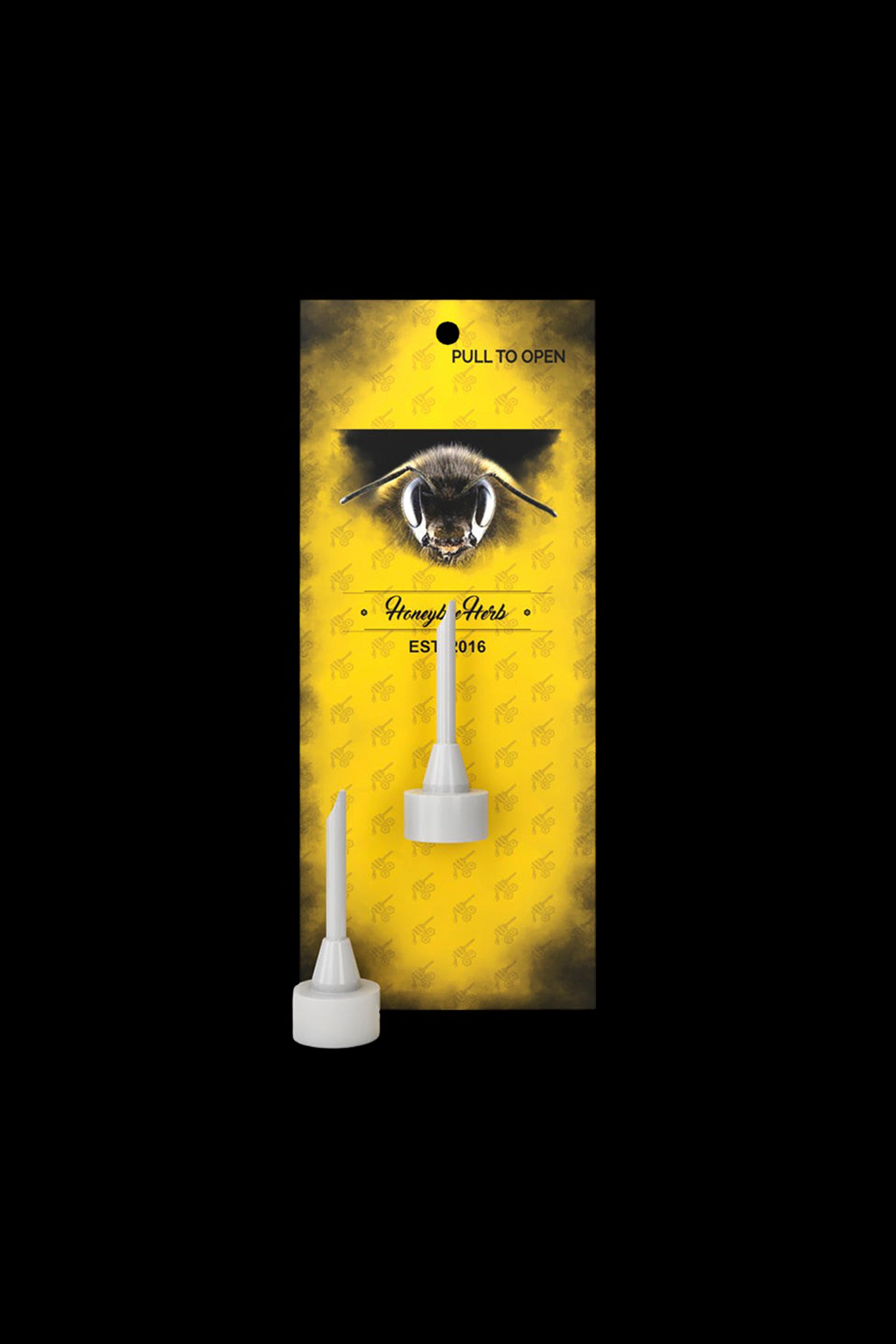 Yellow packaging for “Honey Herbs” cannabis oil vape cartridges featuring a bee illustration.