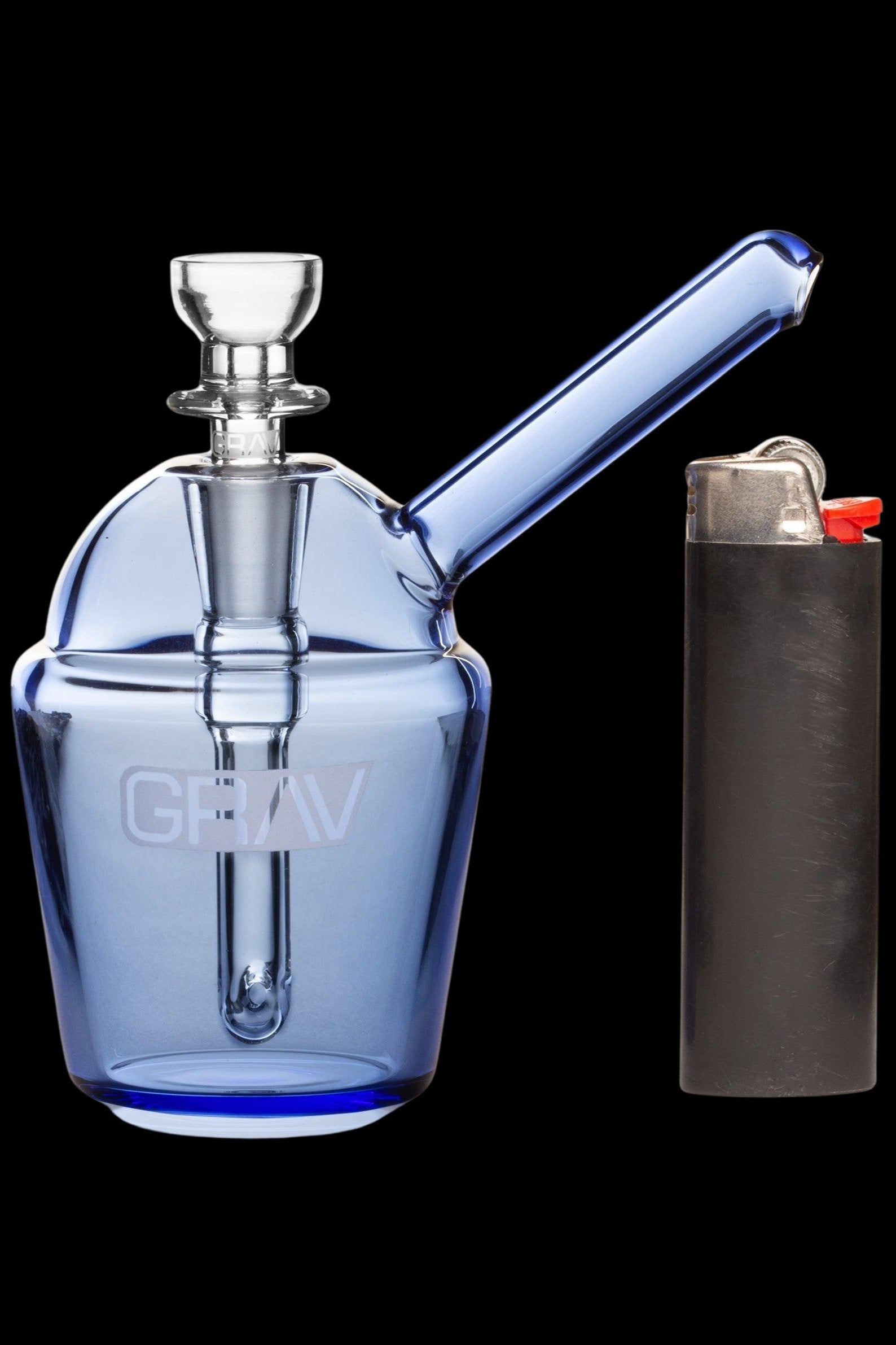 Blue glass bubbler with a lighter beside it.