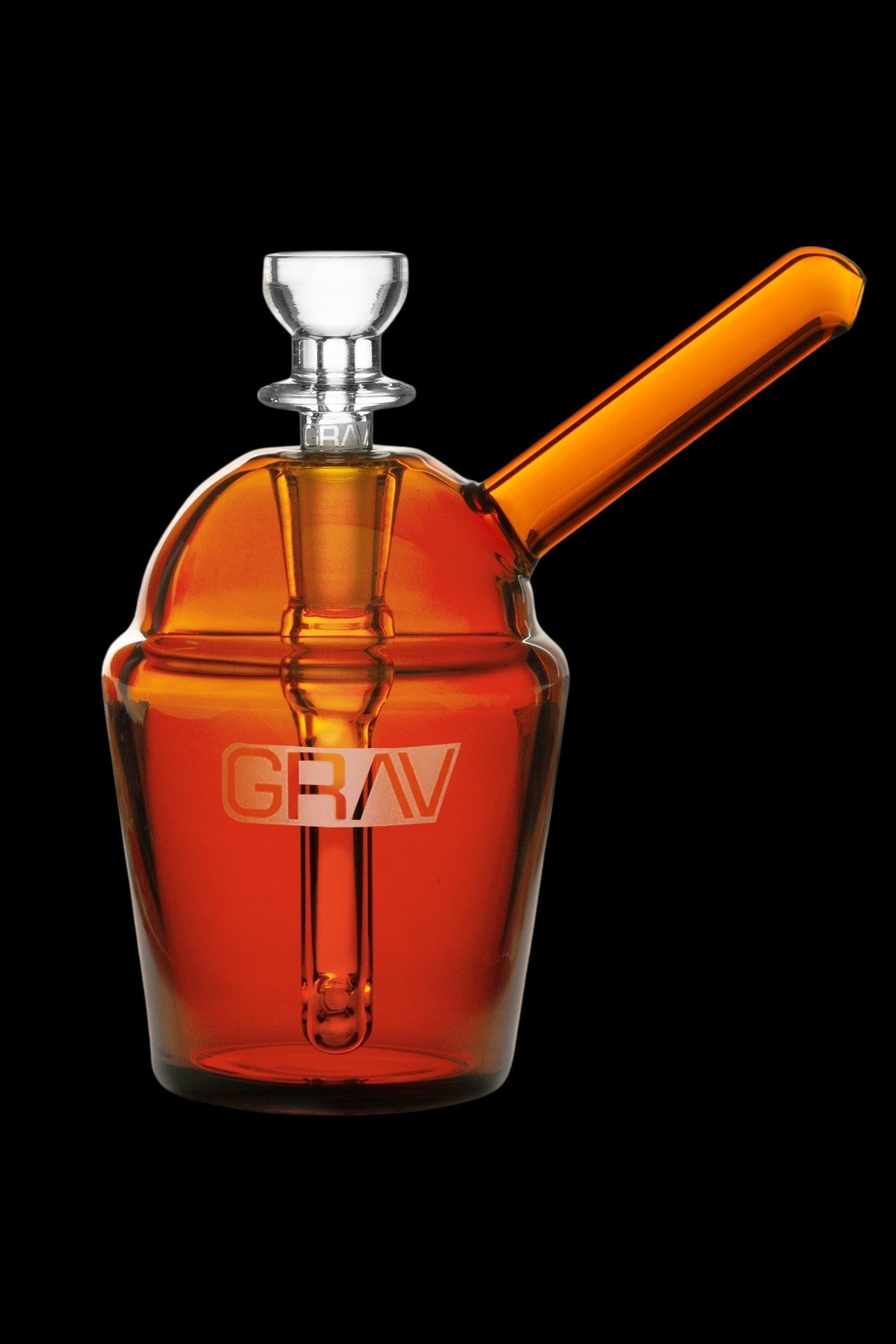 Red glass water pipe with “GRAV” logo, studio shot.