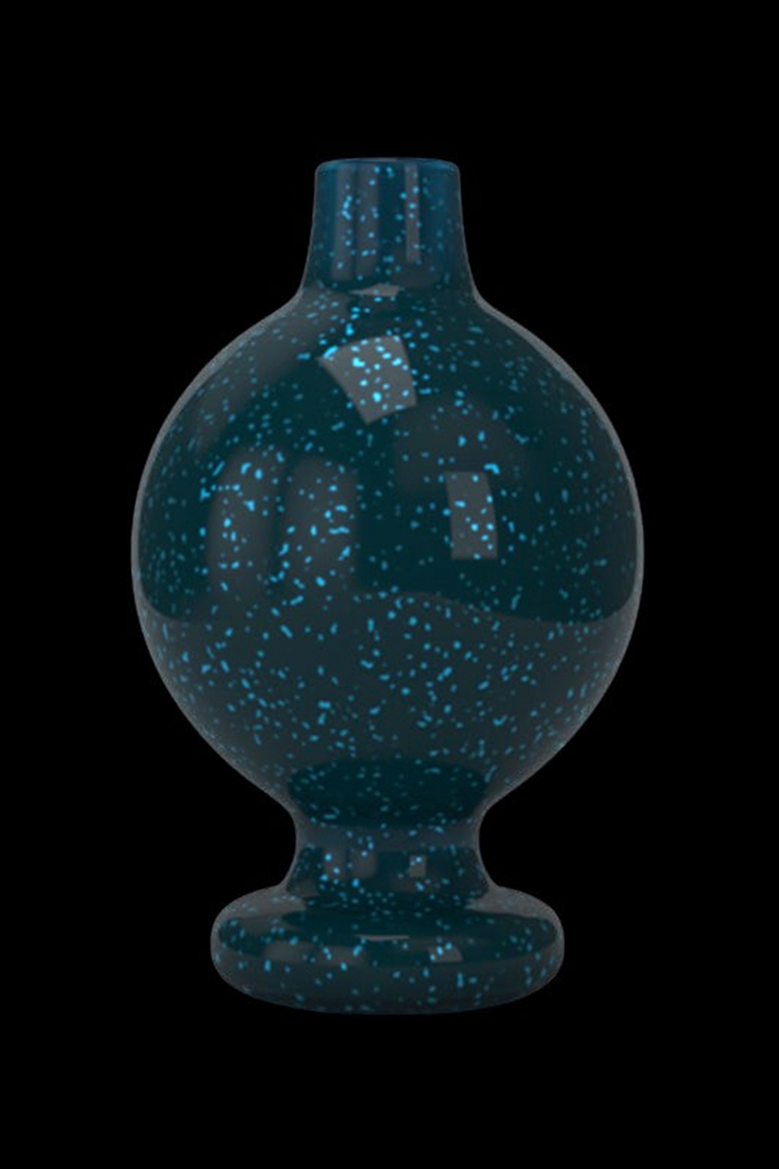 Teal speckled glass dome for a dab rig.
