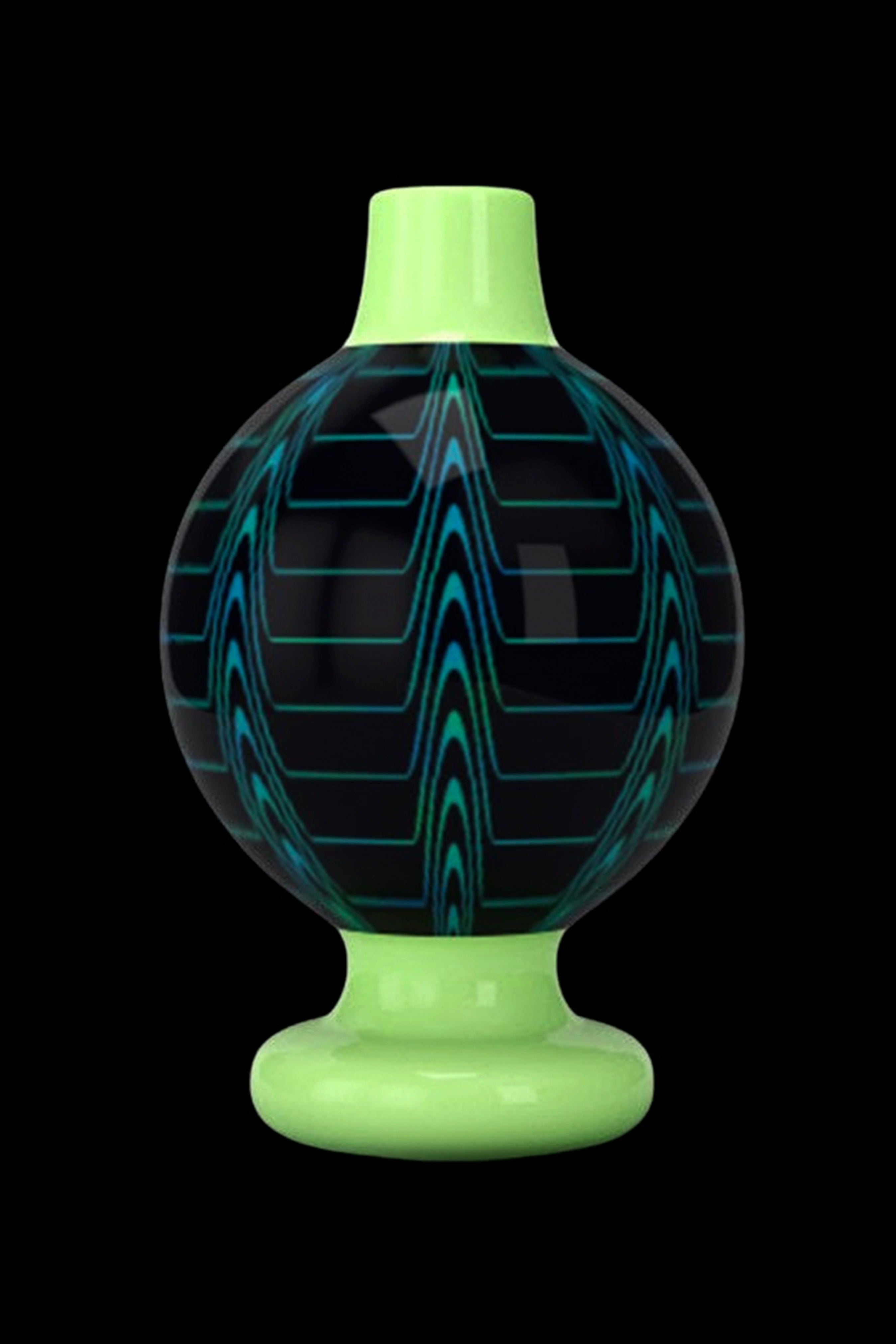 Glowing green glass dome for a cannabis dab rig.