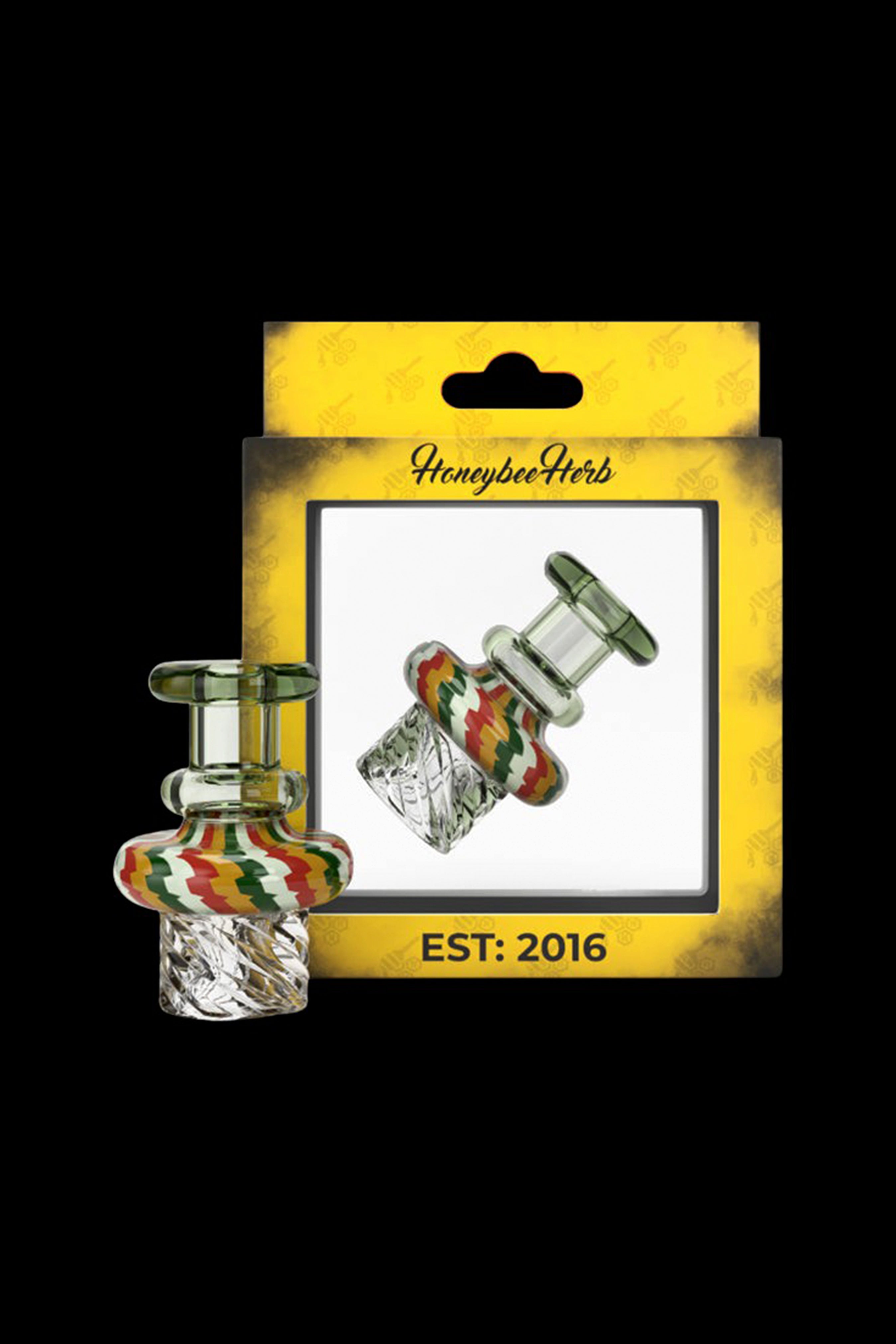 A packaged Honeybee Herb glass nectar collector with red, green, and white marbled accents, established in 2016.