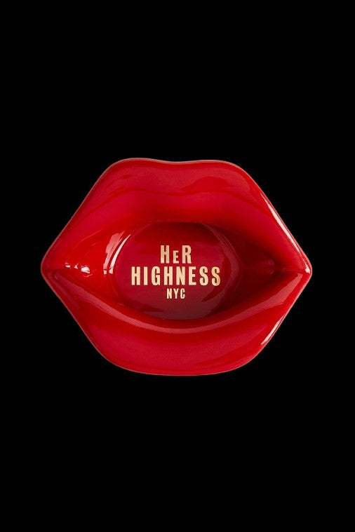 Red, glossy lips shaped as an ashtray with “Her Highness NYC” text inside, against a black background.