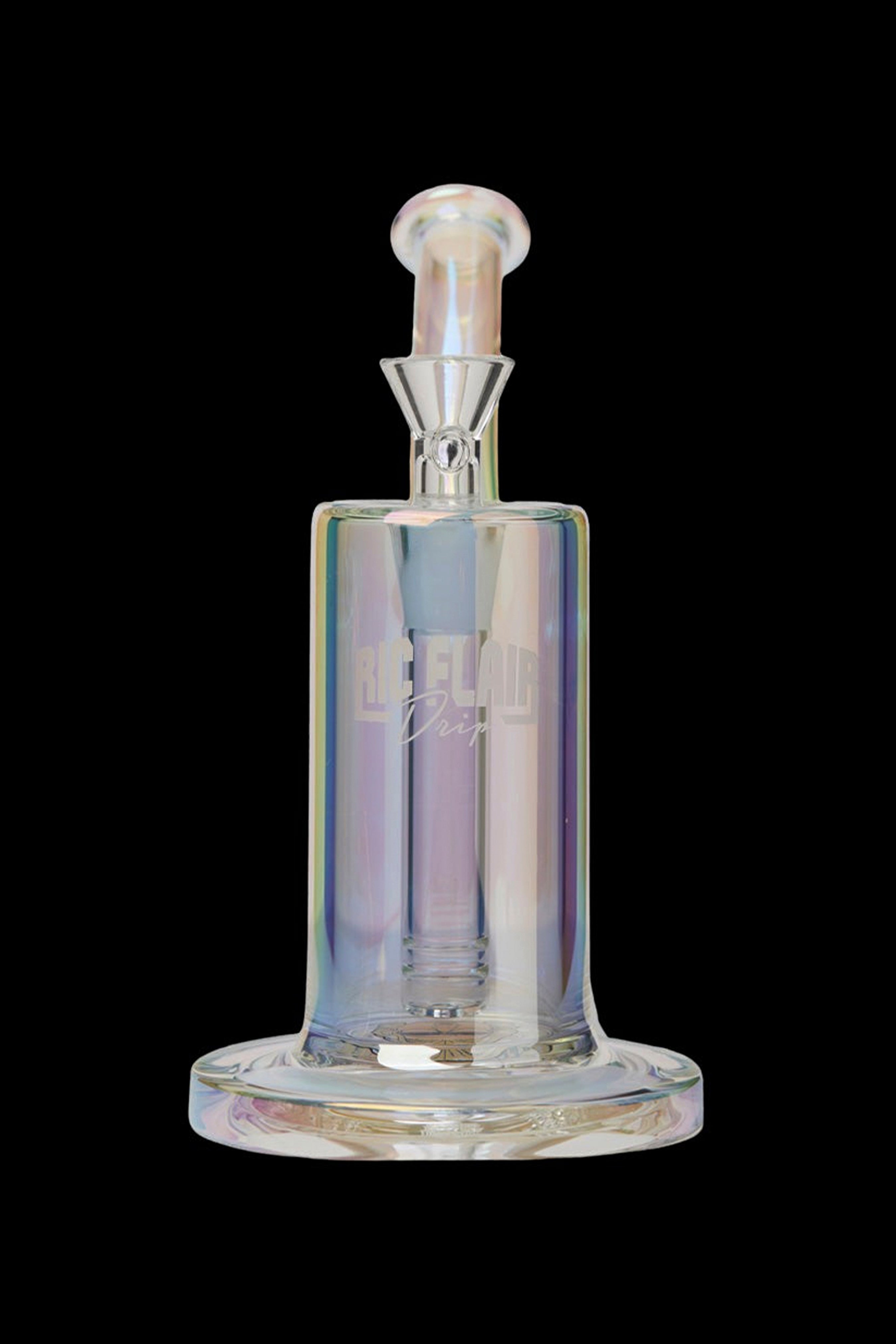 Iridescent glass water pipe (rig) with a flared base and mouthpiece, isolated on a black background.
