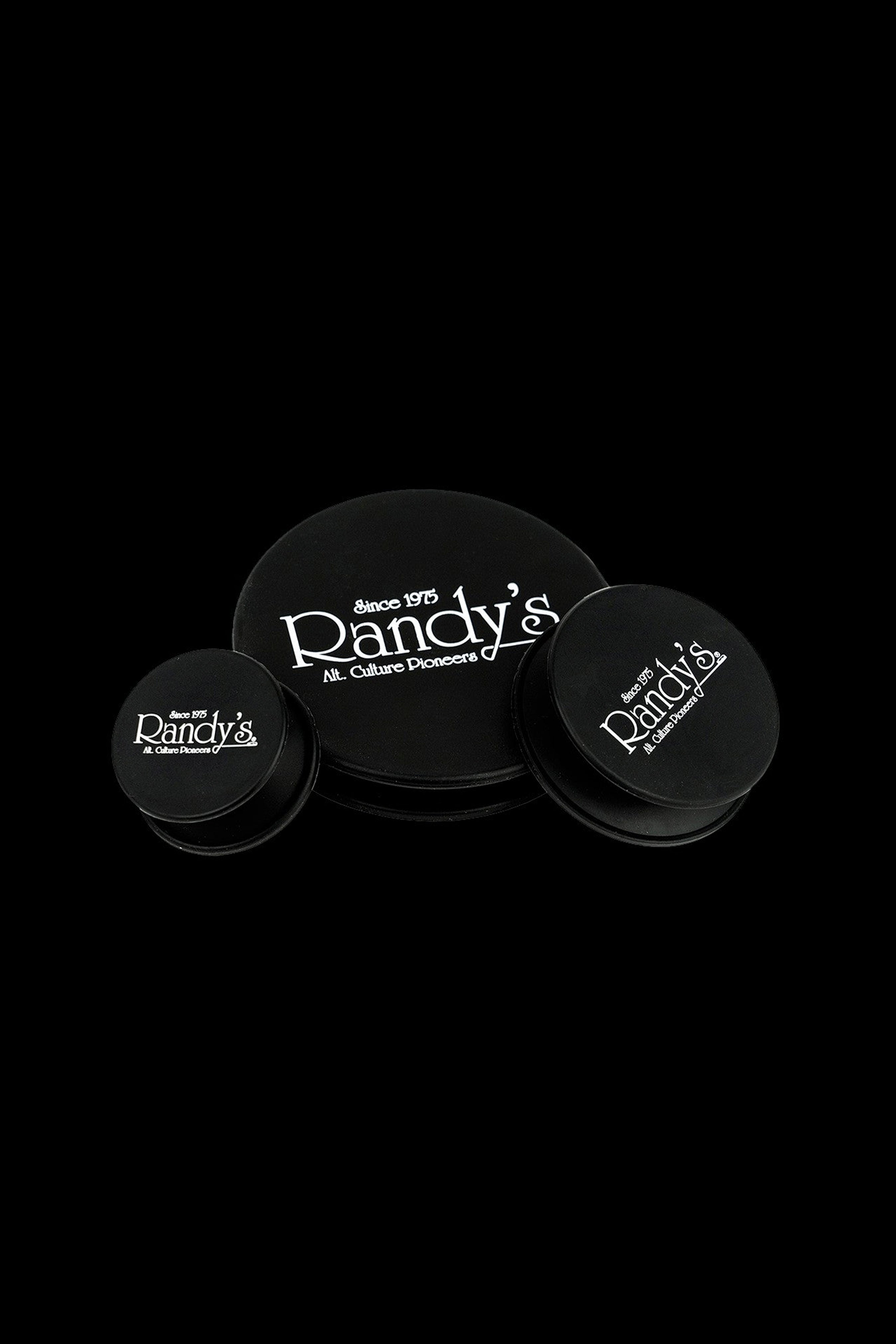 Three black containers with the “Randy’s” logo and “Since 1975 – Alt. Culture Pioneers” text on a black background.