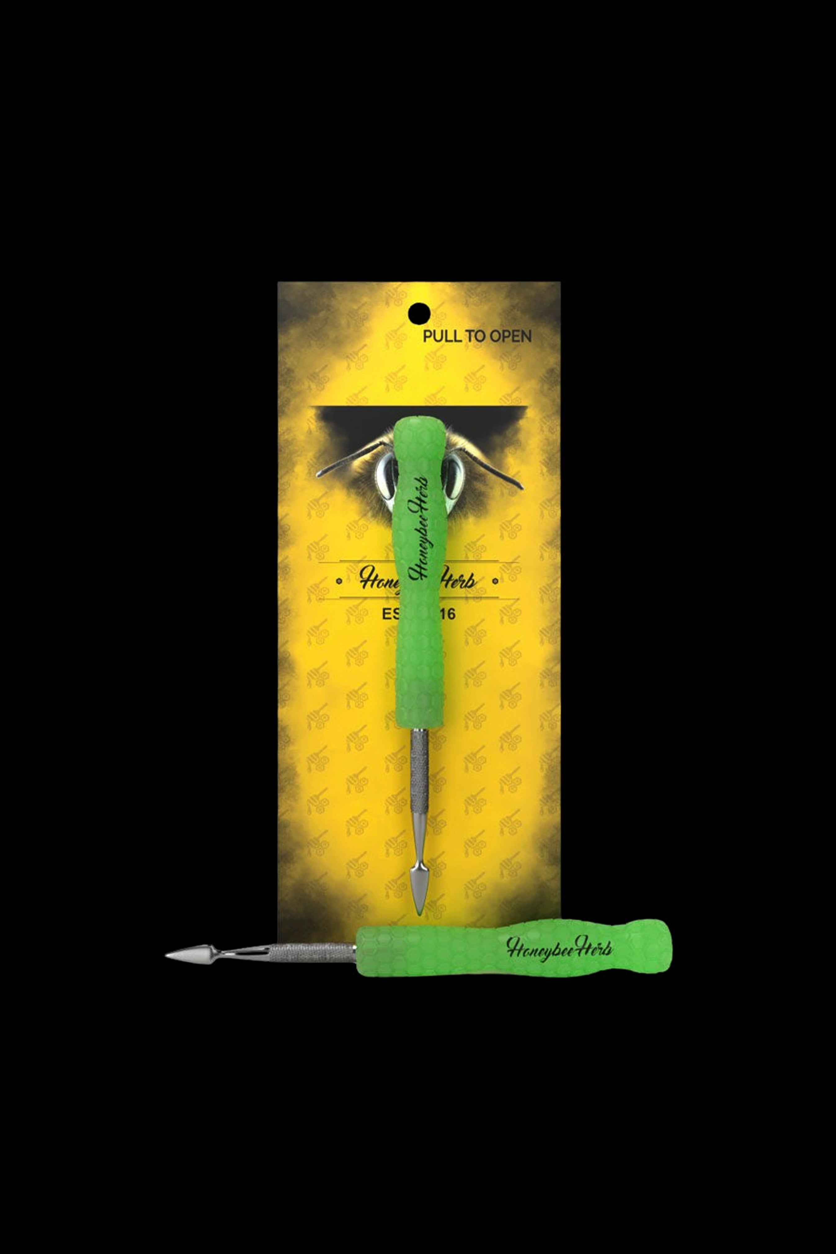 Green Honeybee Herb applicator tool packaged in a patterned yellow sleeve.