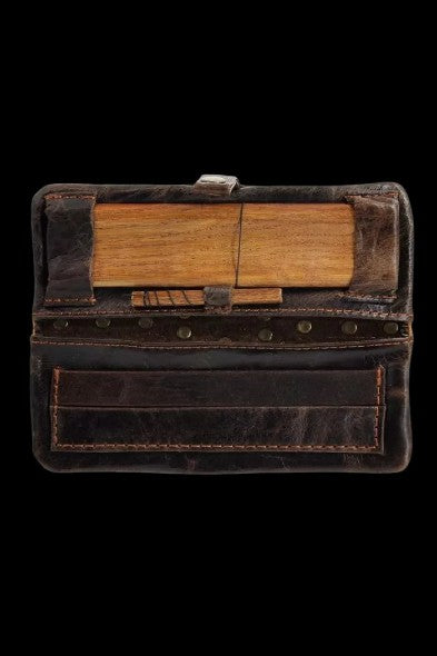 Brown leather smell-proof case with compartments, likely for cannabis storage.