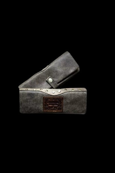 Black cannabis smell-proof case open, revealing a padded interior.