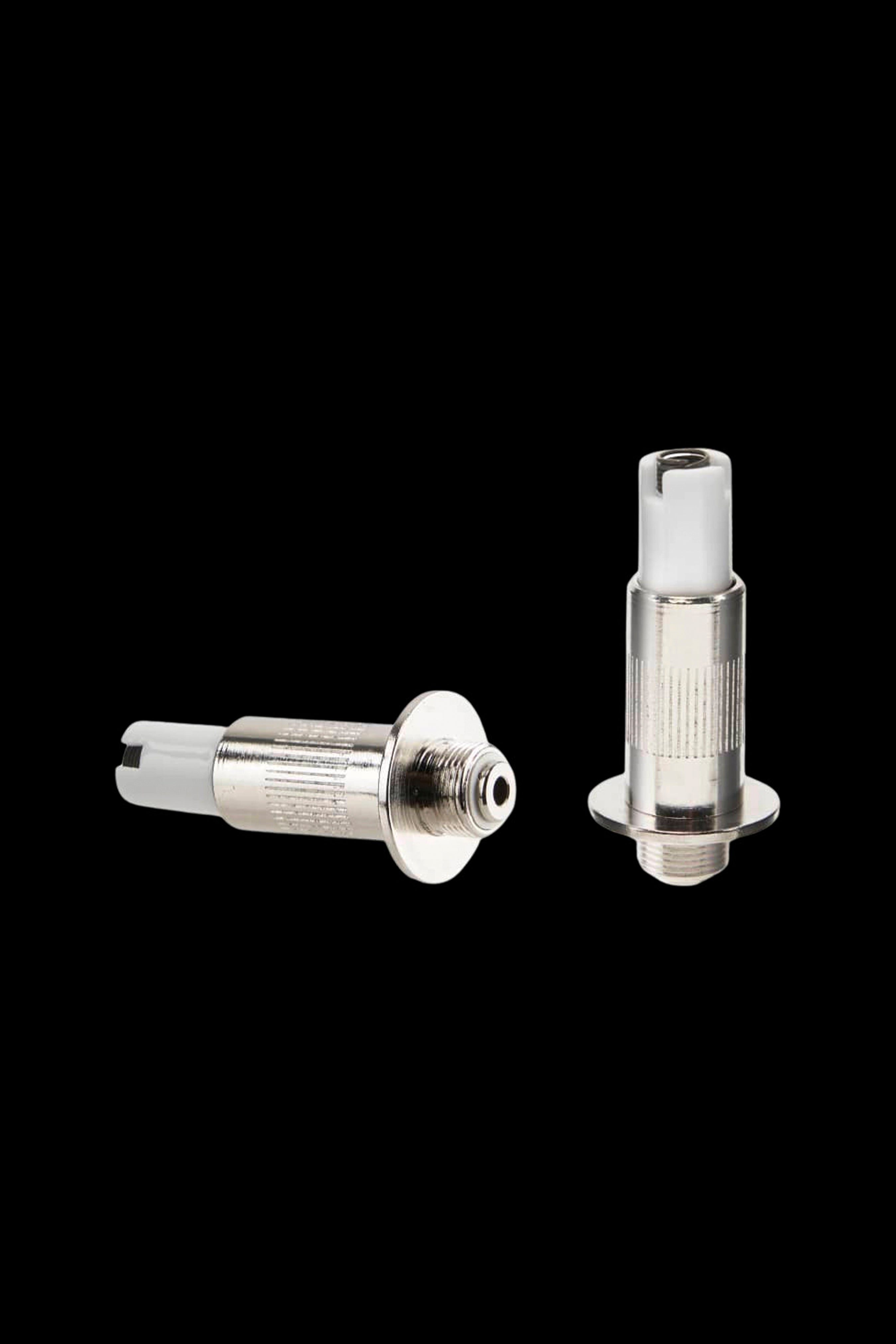 Silver cannabis oil atomizer components on a black background.