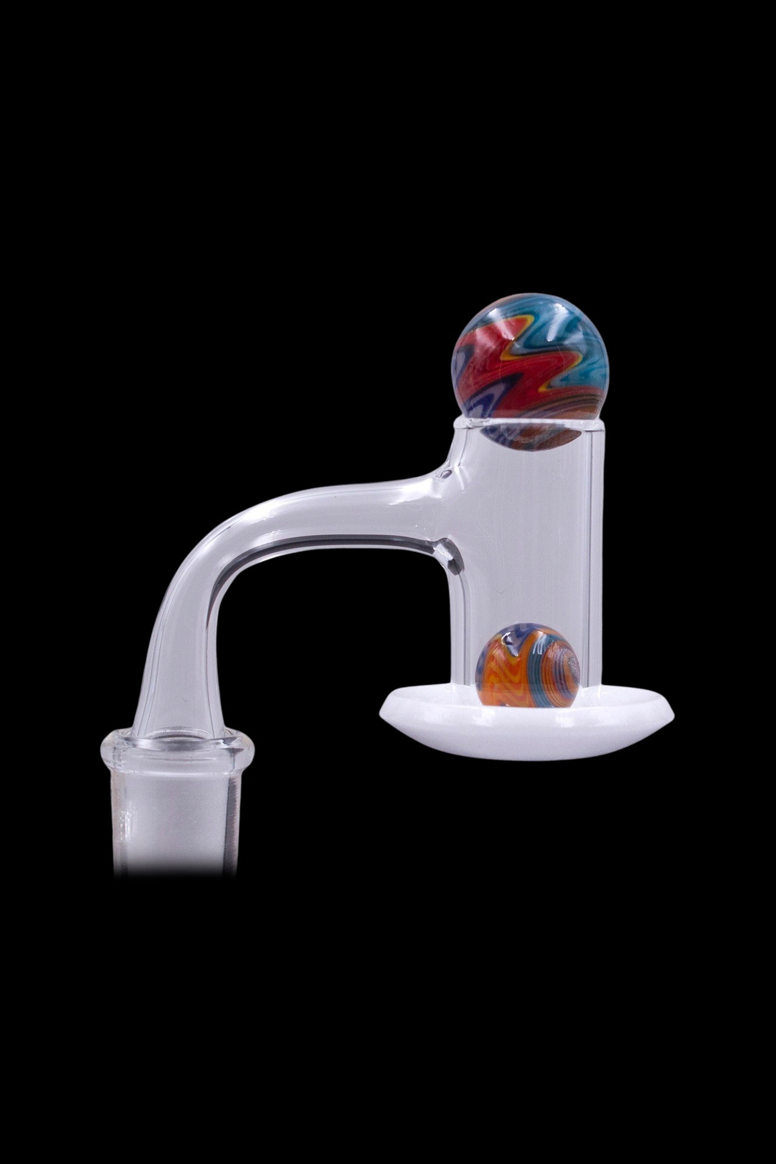 Glass oil rig with colorful marbled glass inserts.