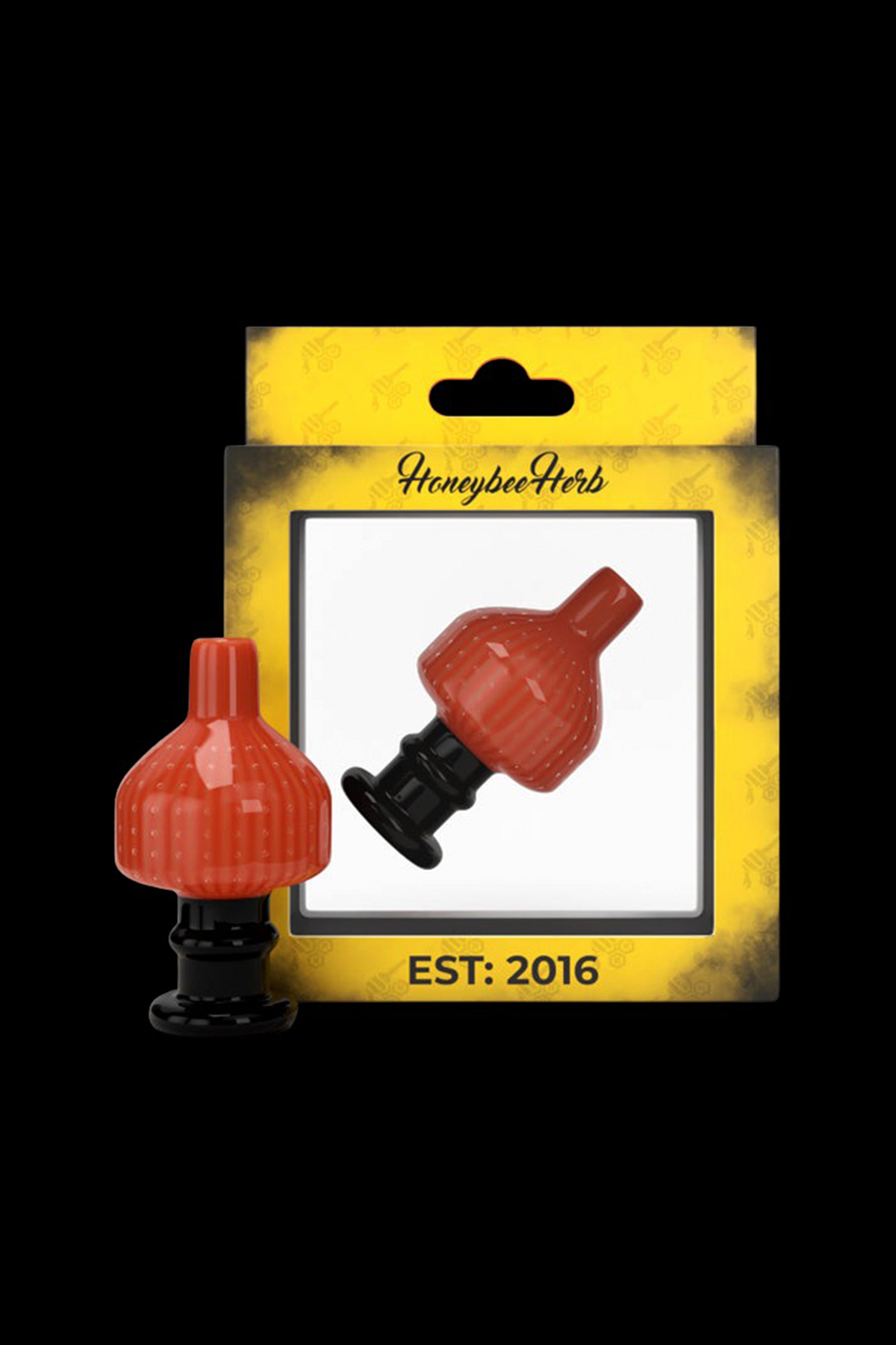 Red glass bubbler for dabbing, packaged with “Honeybee Herb” branding and “EST: 2016” on a yellow card.