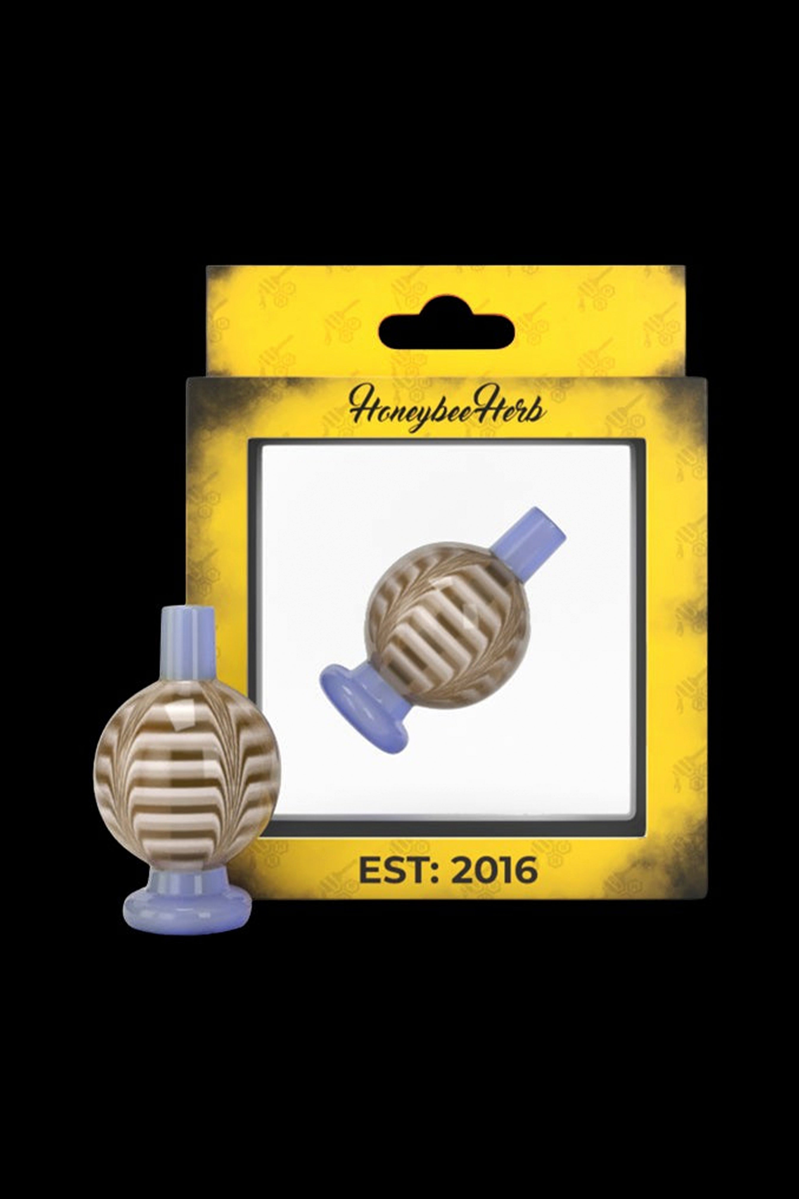 Glass cannabis water pipe attachment resembling a beehive, packaged with branding for HoneybeeHerbs, est. 2016.