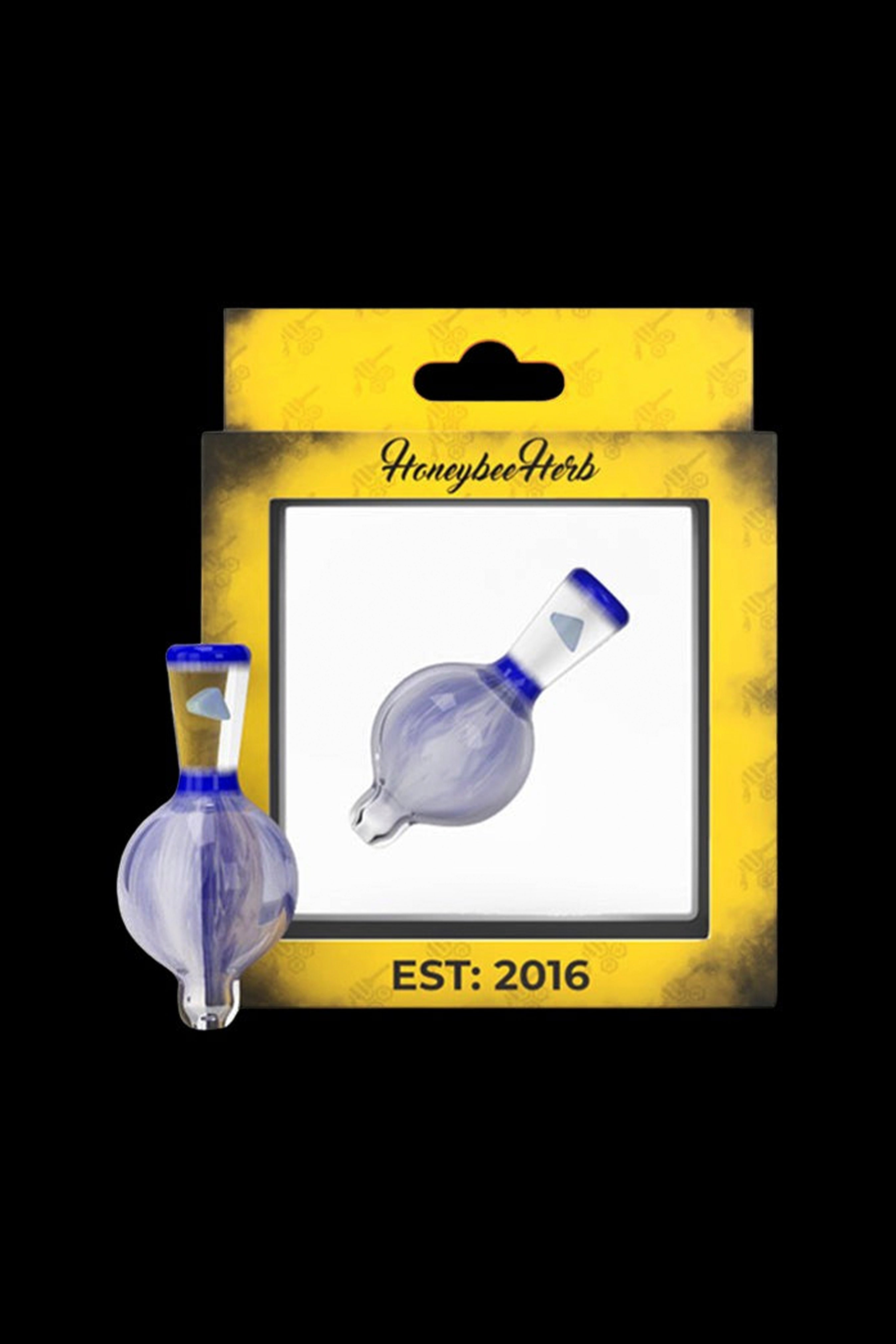 Blue glass dab cap displayed on a branded retail card with “Honeybee Herb” and “EST. 2016”.