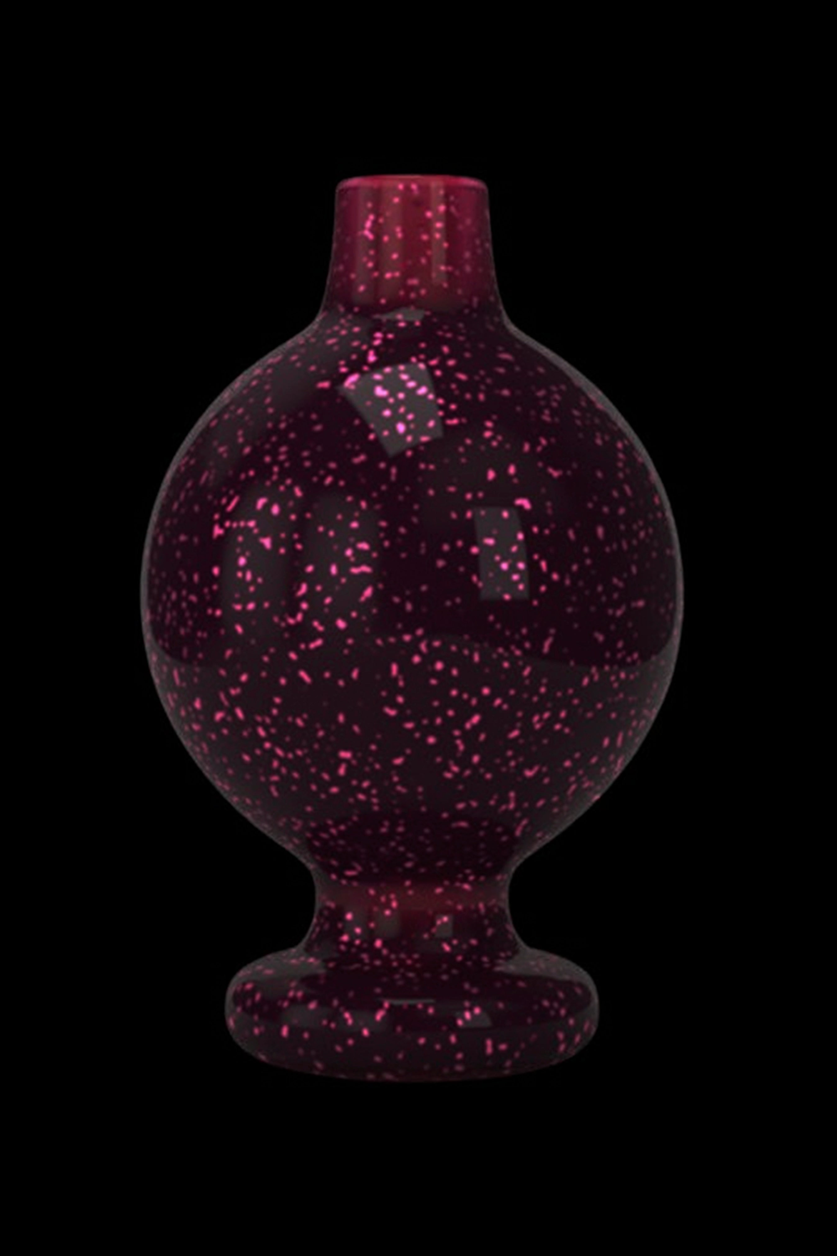 Pink speckled glass dome for a dab rig.