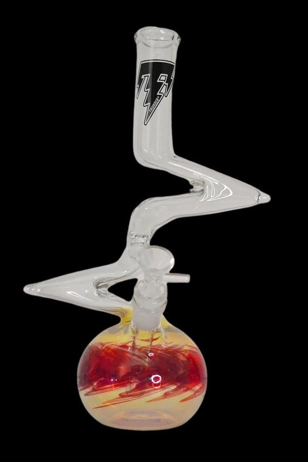 Clear glass water pipe (bong) with a round, orange and yellow swirled base and intricate glasswork.