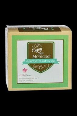 Beige cannabis concentrate packaging box with green accents and text reading "Enjoy Your Morning!"