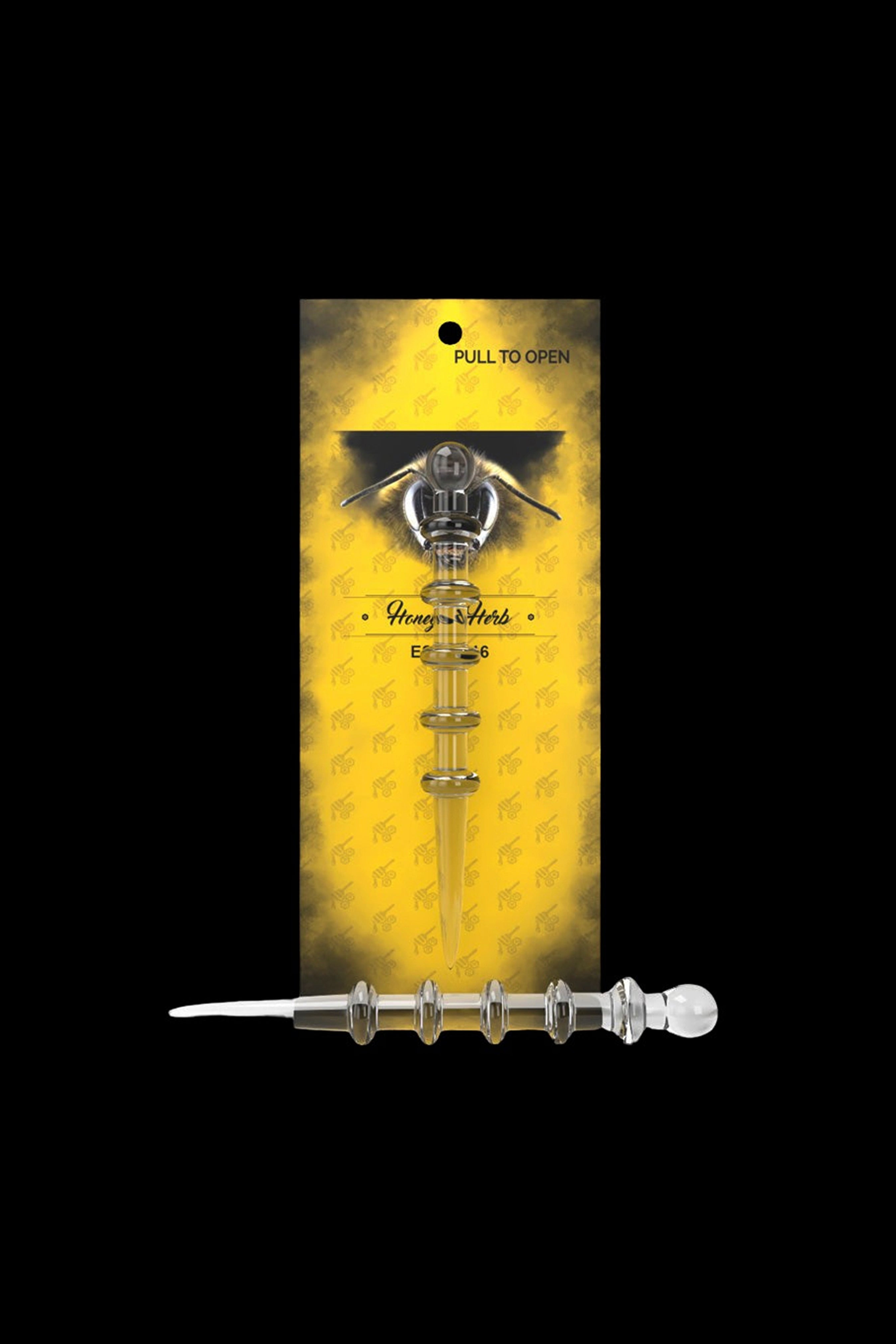 Glass oil burner pipe for cannabis concentrate displayed in packaging.