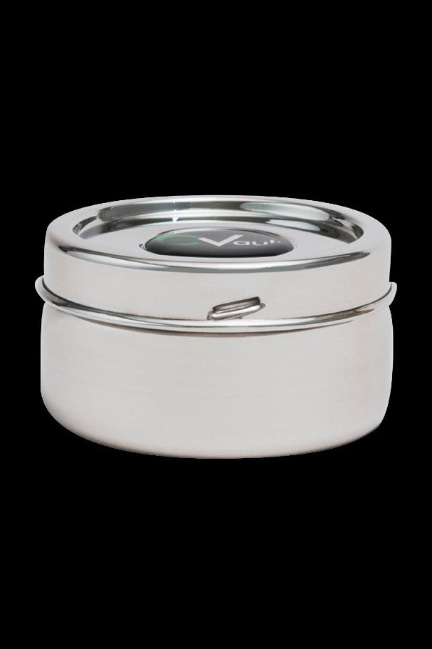 Silver cannabis storage container with a magnetic closure.