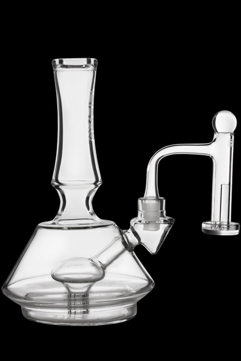 Clear glass bong with a downstem and bowl, isolated on a black background.