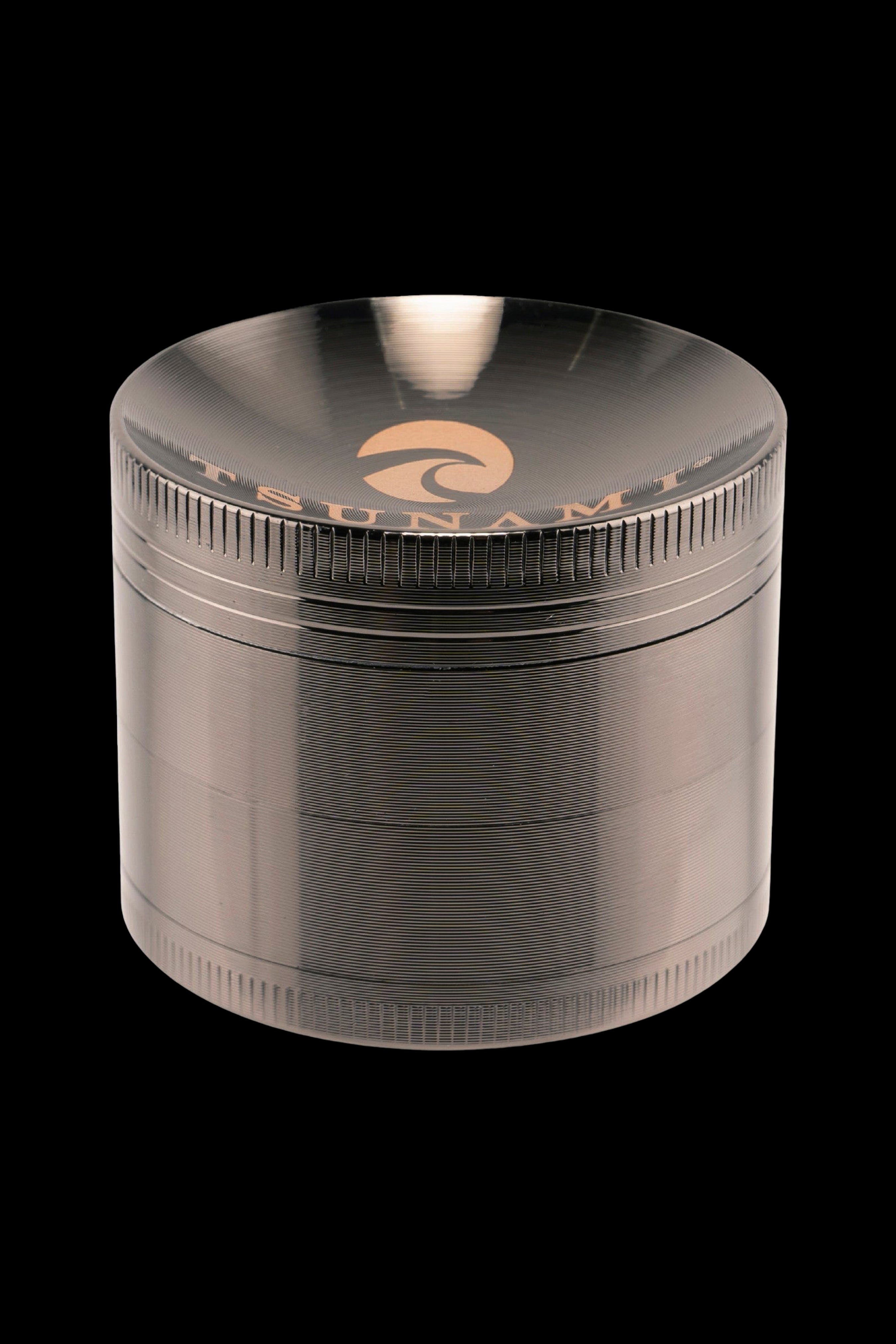 Metal cannabis grinder with textured grip and branded lid.